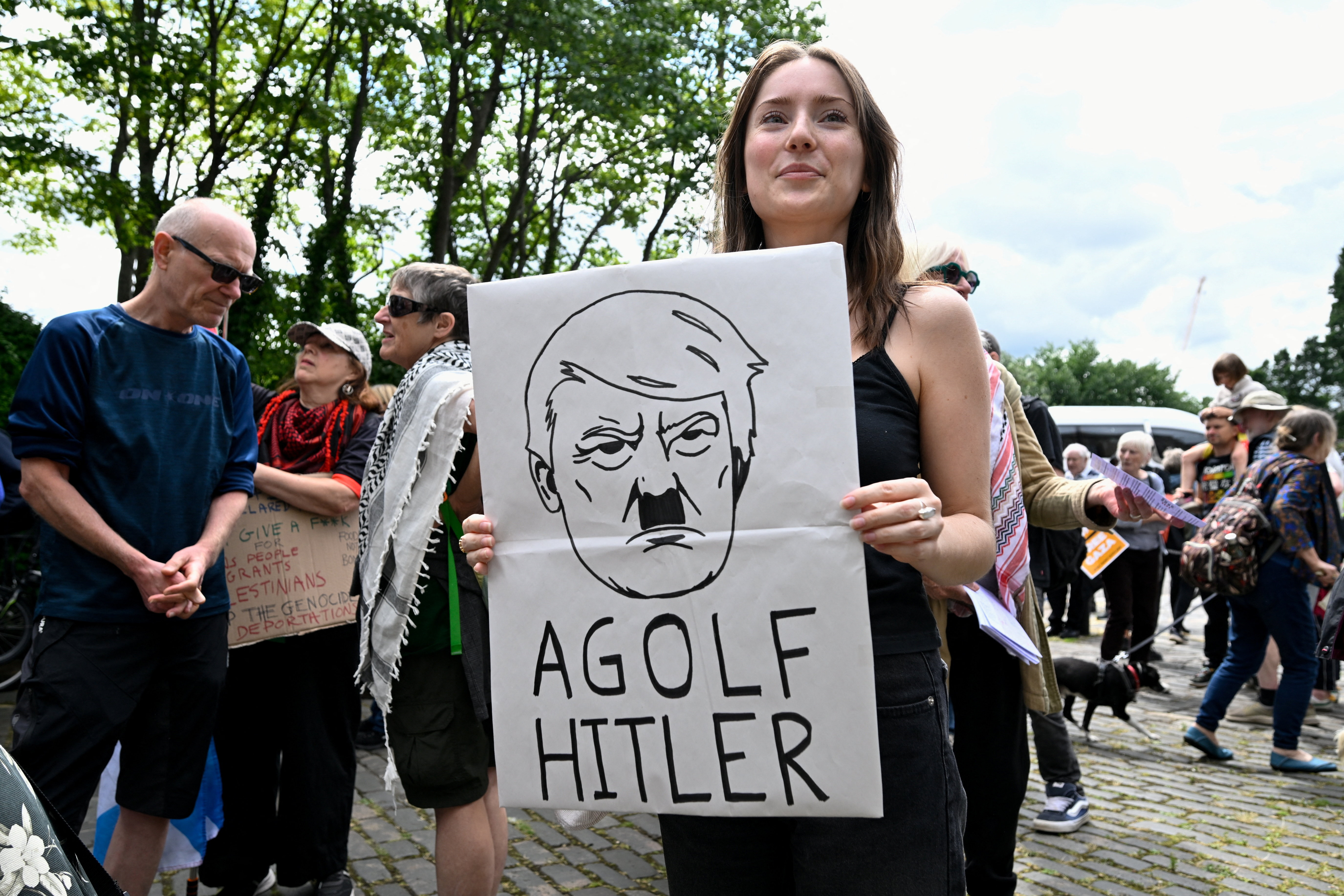 cover Trump golfs in Scotland as Epstein questions persist
