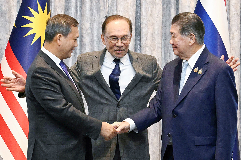 cover Thai, Cambodian leaders agree to ceasefire after five days of battle