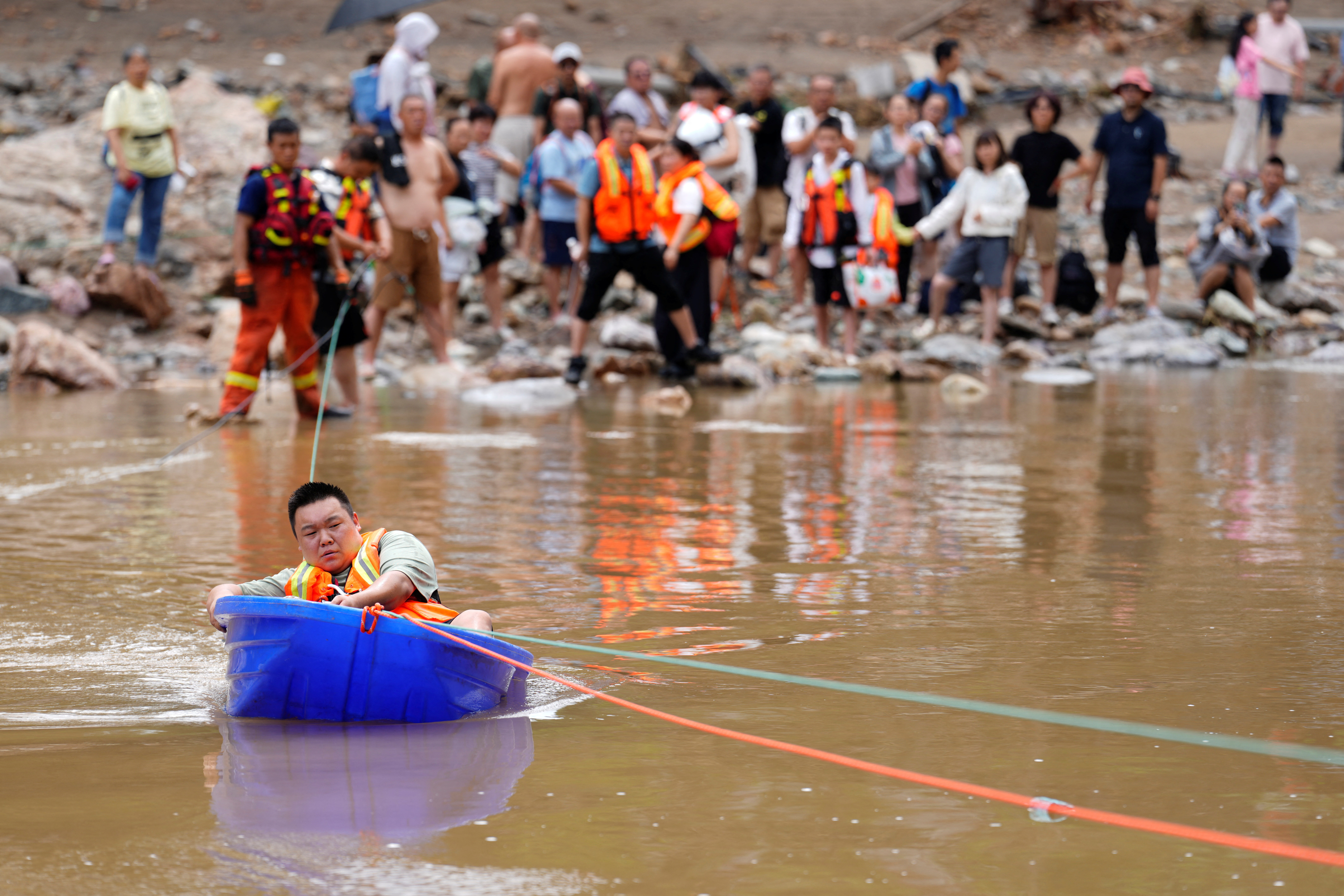 cover Extreme weather turns Beijing into rain trap, kills at least 30
