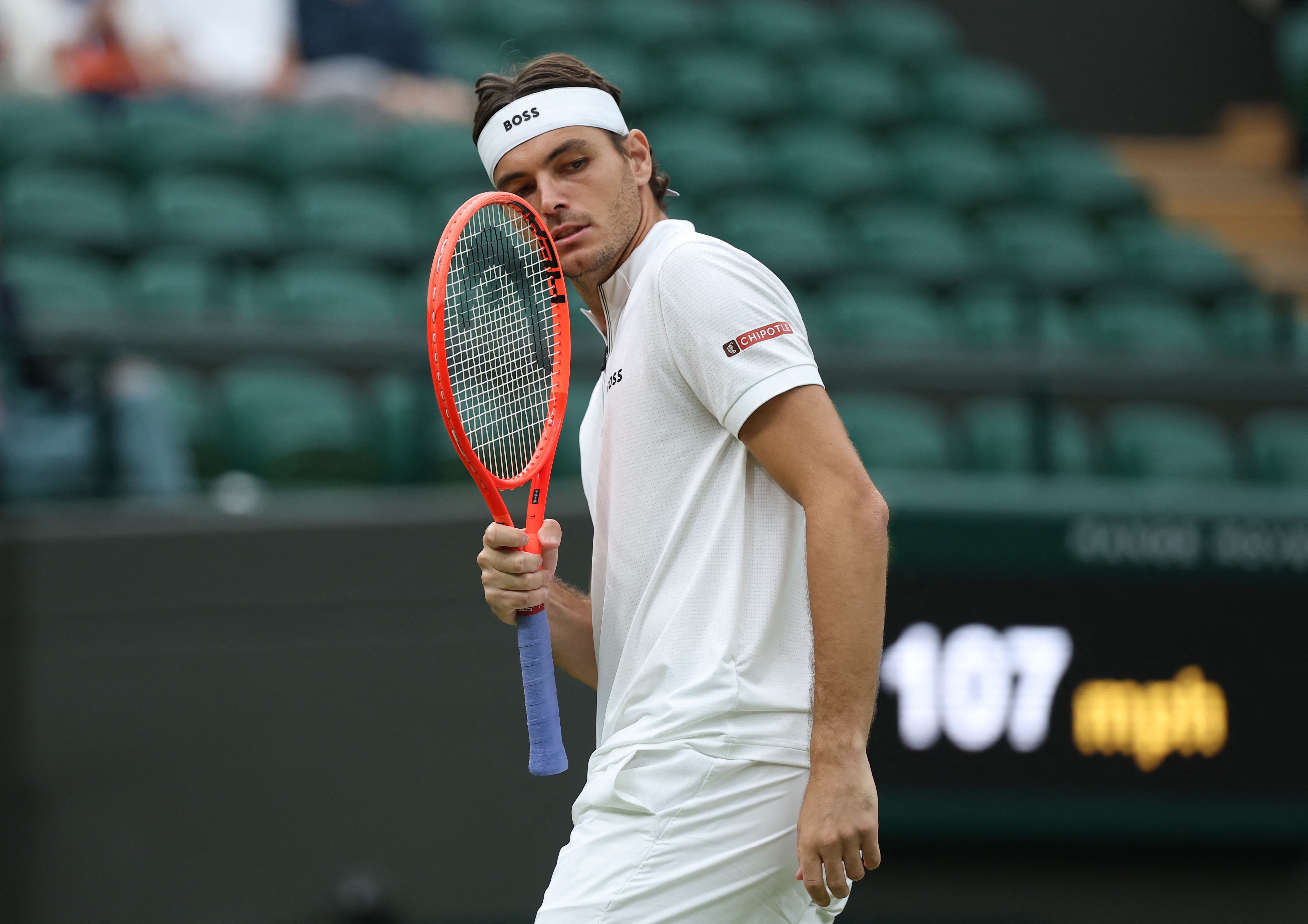 cover Fritz through to Wimbledon quarter-finals after injured Thompson retires