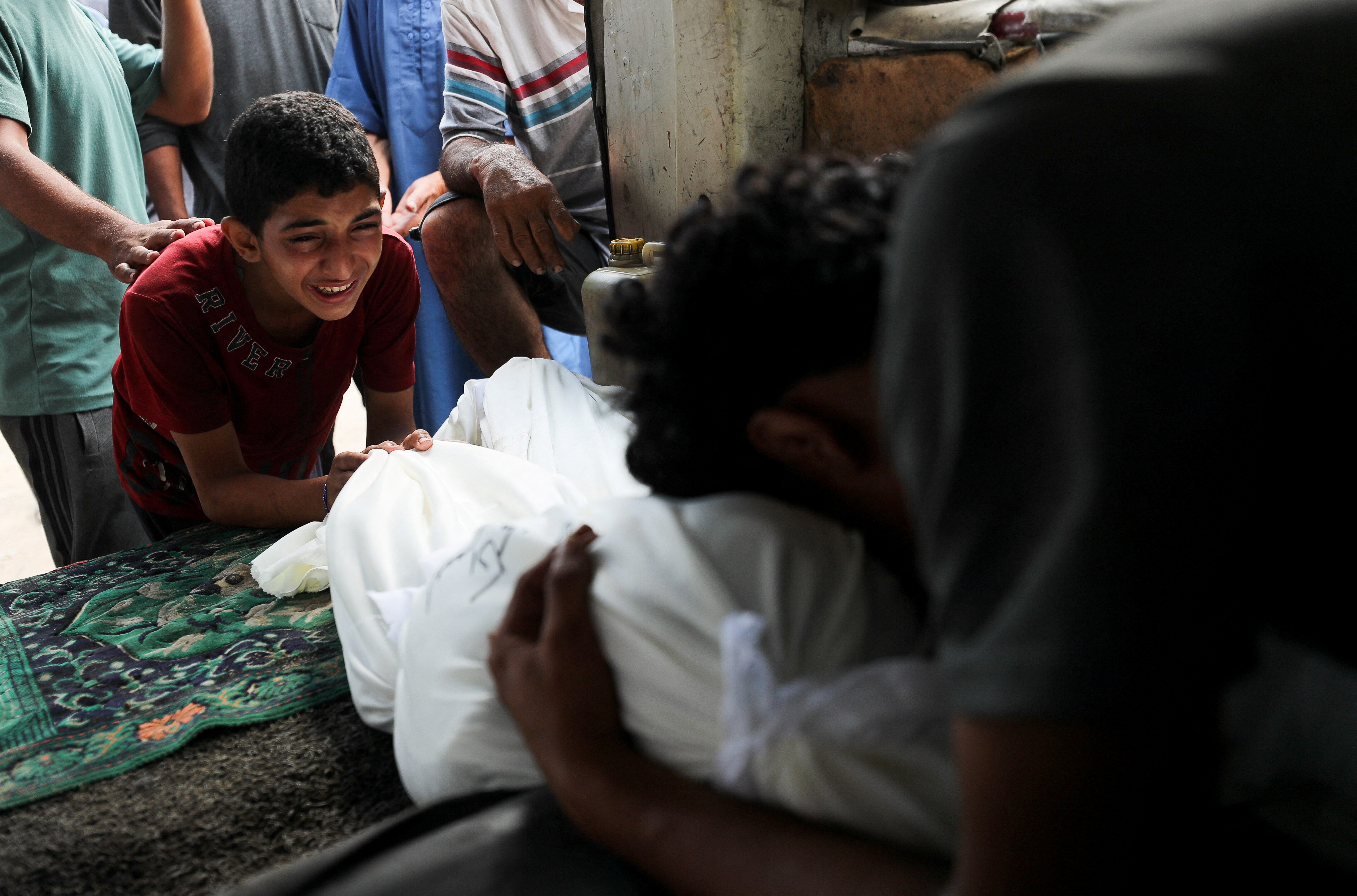 At least 32 killed by Israeli fire while seeking aid in Gaza, hospital says