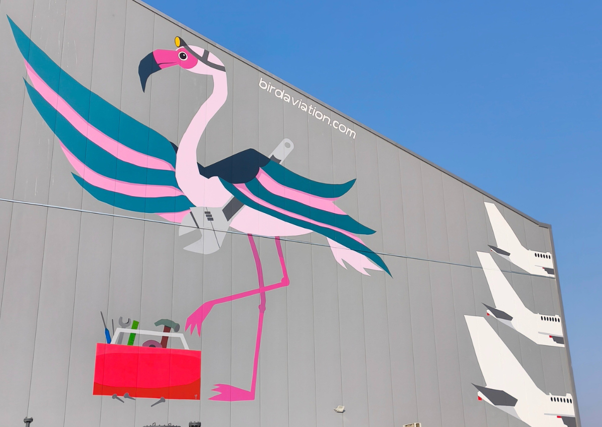 cover New mural visible as planes fly into Larnaca