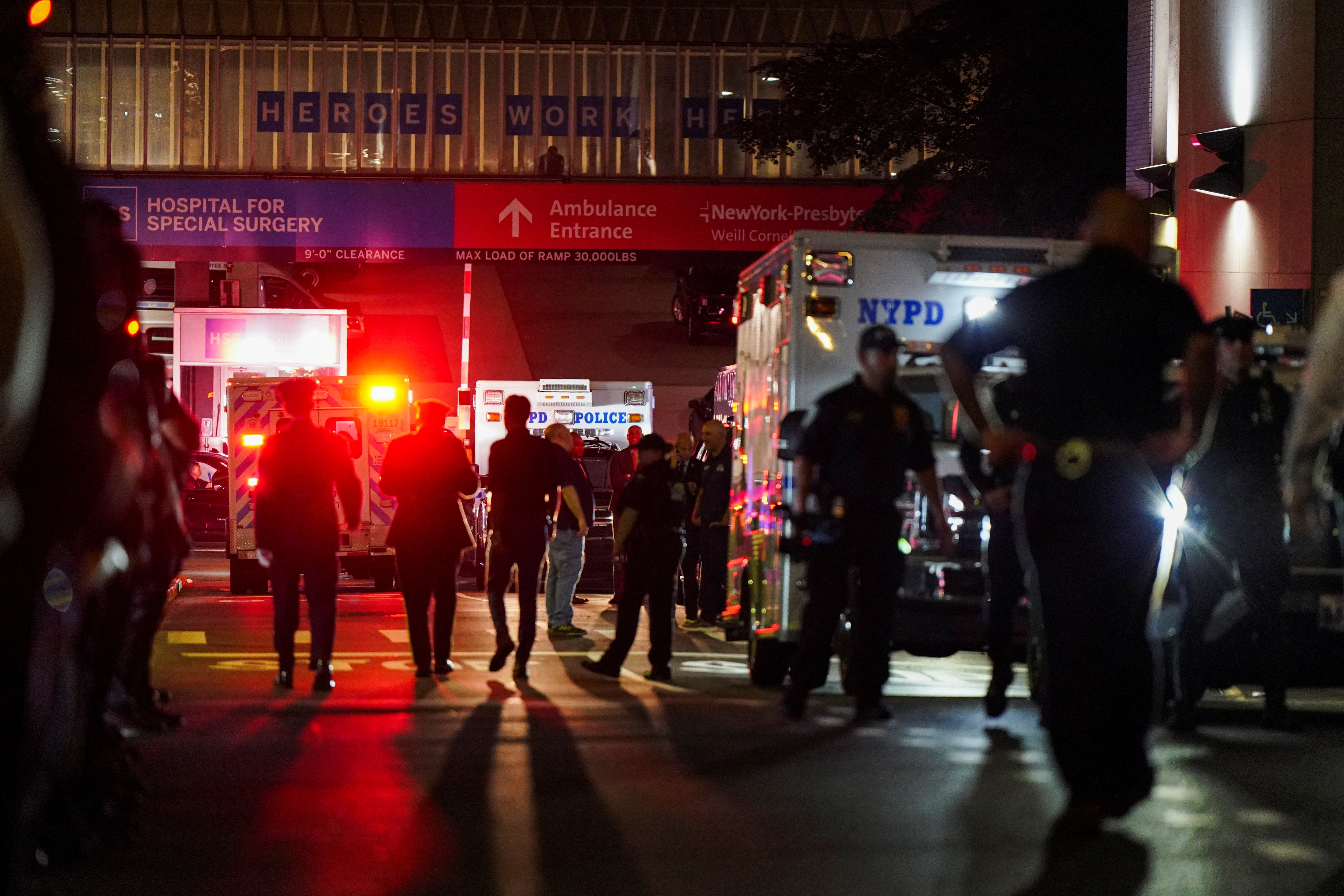 cover Police seek clues to motive behind deadly mass shooting in Manhattan office tower