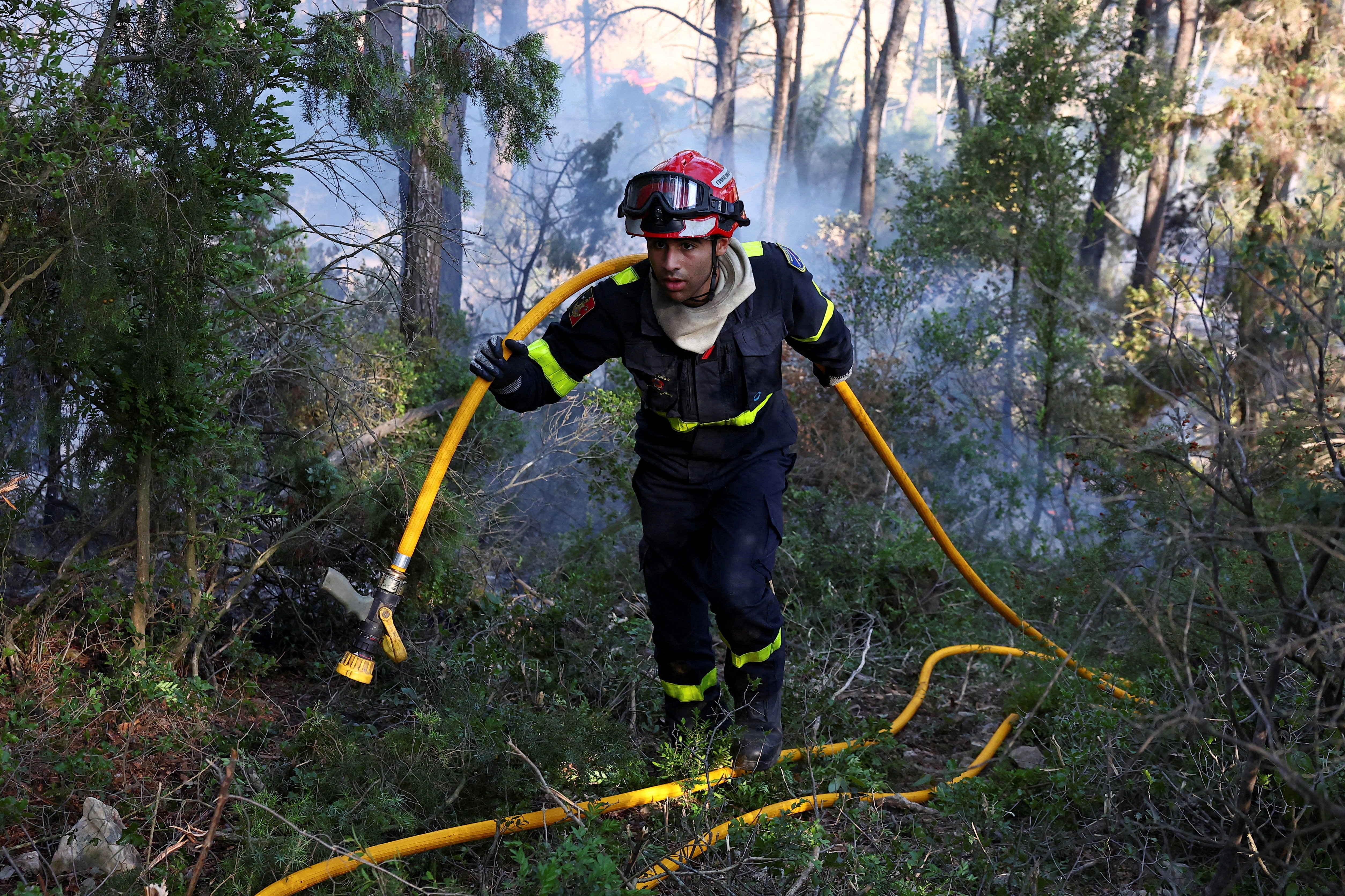 cover France&#8217;s biggest wildfire since 1949 moving more slowly but not yet under control