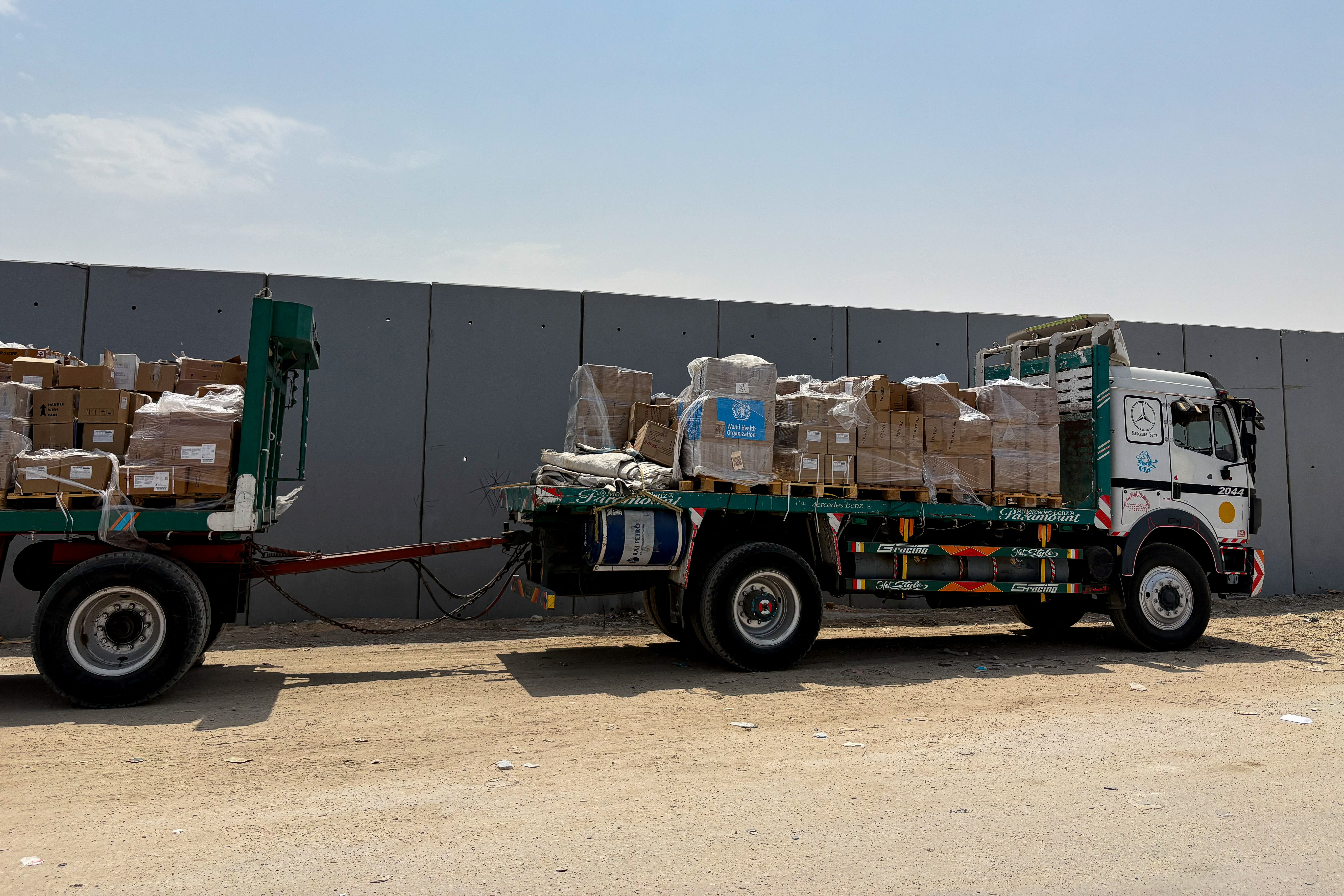 Turned back from Gaza, aid shipments languish in warehouses, on roadsides
