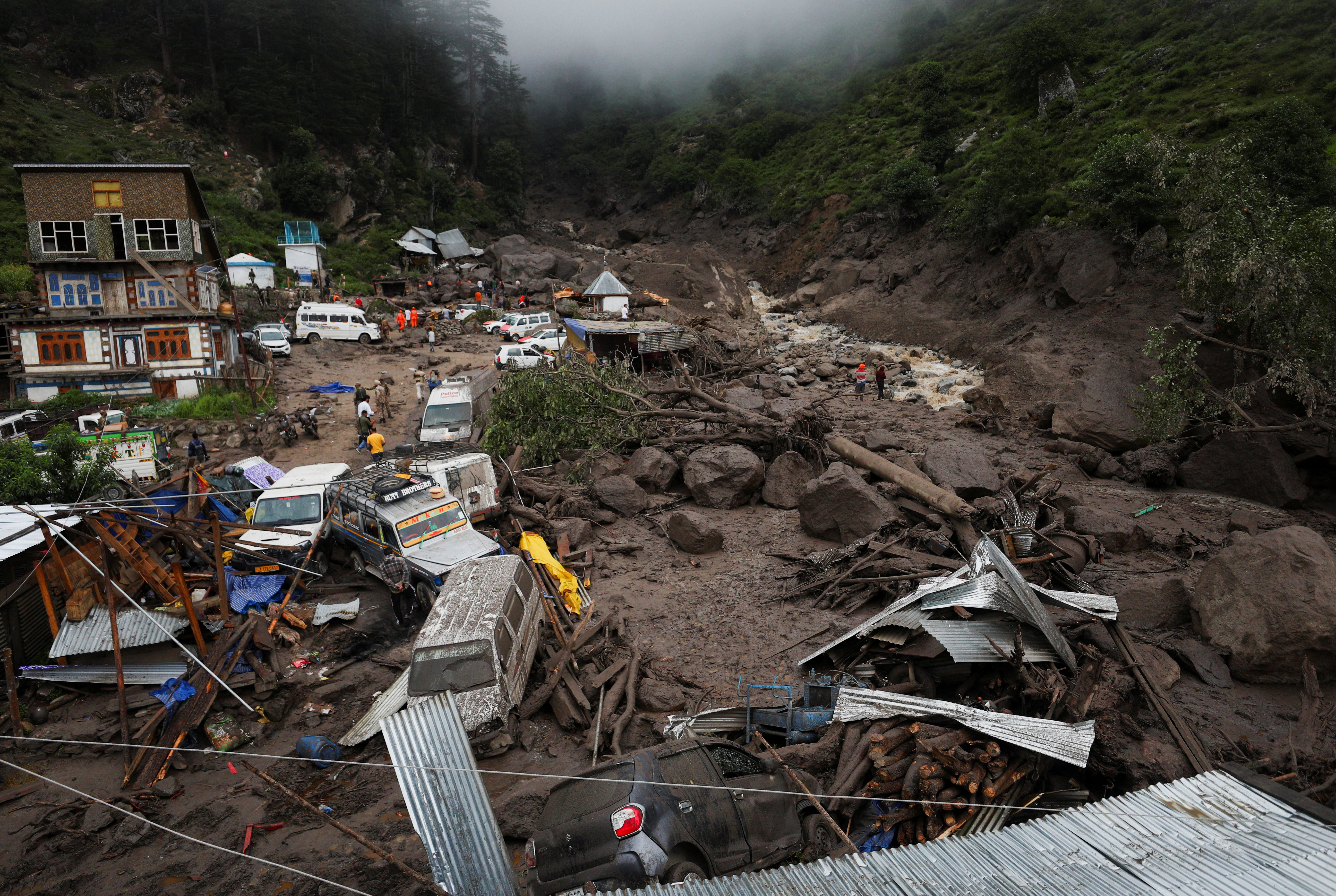 cover Floods and landslides in Indian Kashmir kill 60, over 200 missing