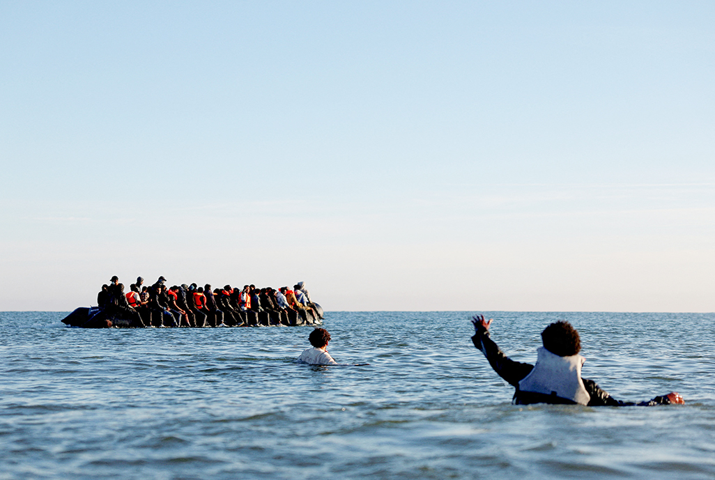 cover UK migrant arrivals on small boats reach new record