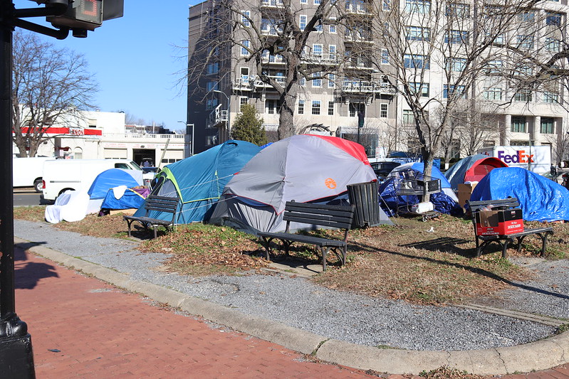 cover President Trump plans to “clear out” homeless in Washington DC amid dispute over crime stats