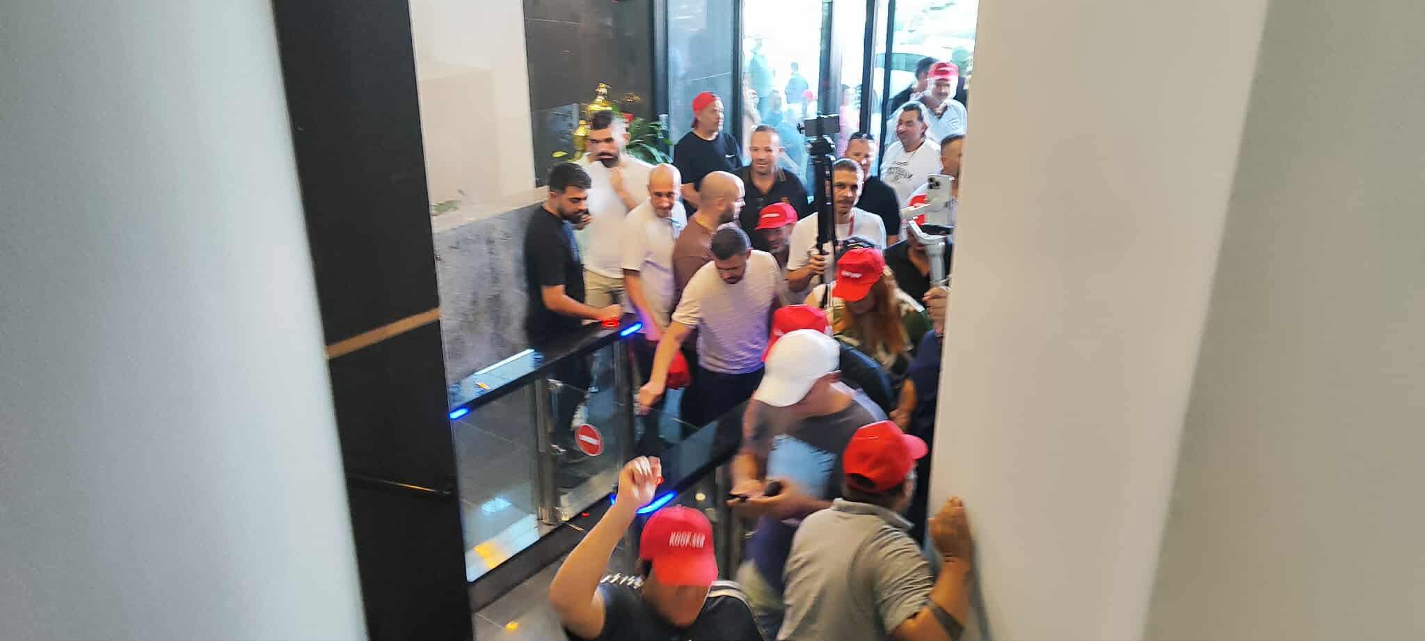 Striking workers break into bank’s headquarters in north