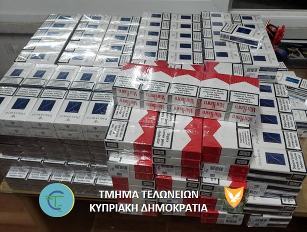 cover Large quantities of cigarettes confiscated at checkpoints