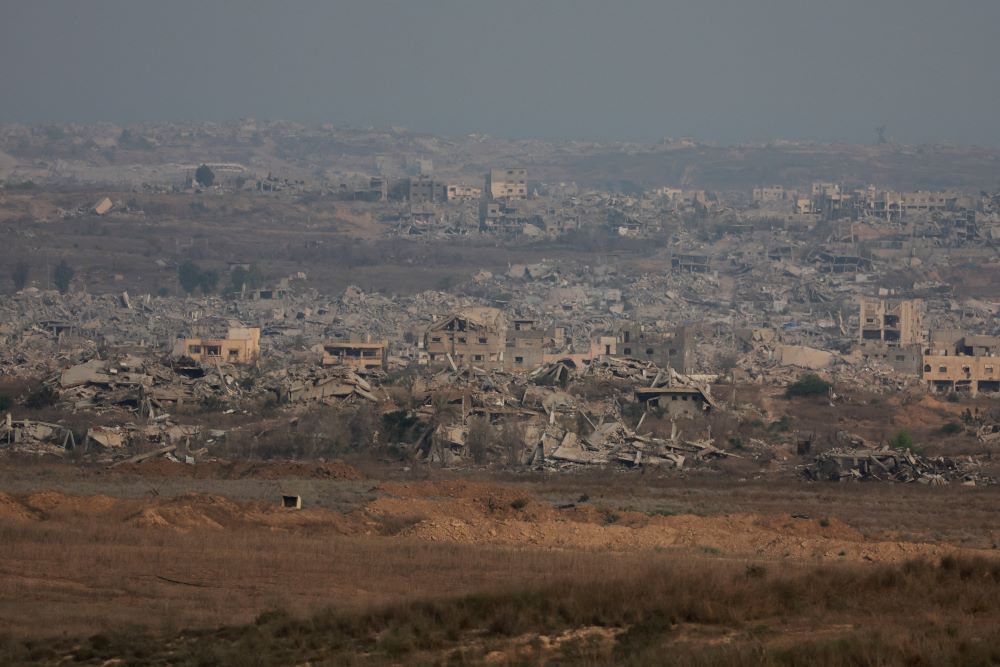 Israel pounds Gaza City suburbs, vows to press on with offensive