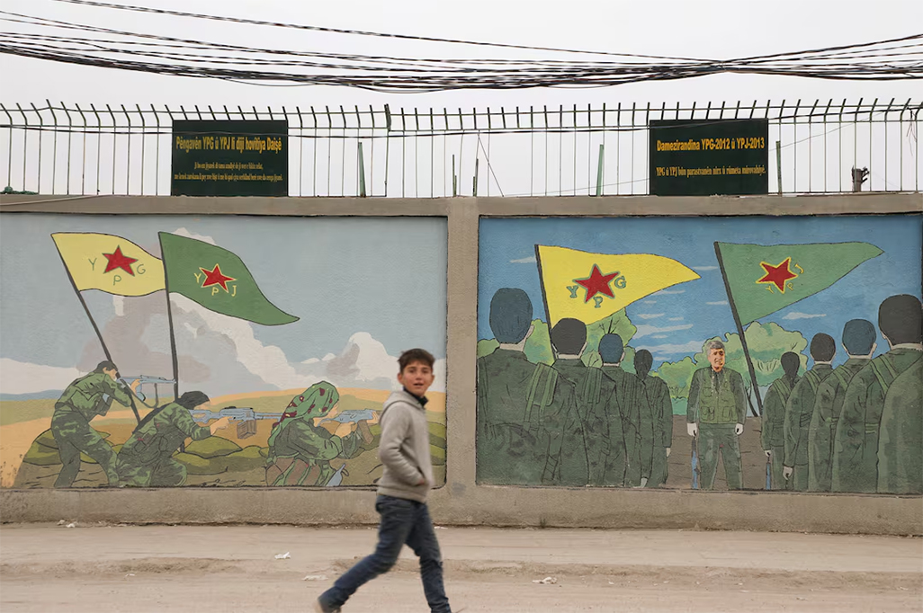 cover Syrian Kurdish YPG should stop delaying Syria integration, Turkey says