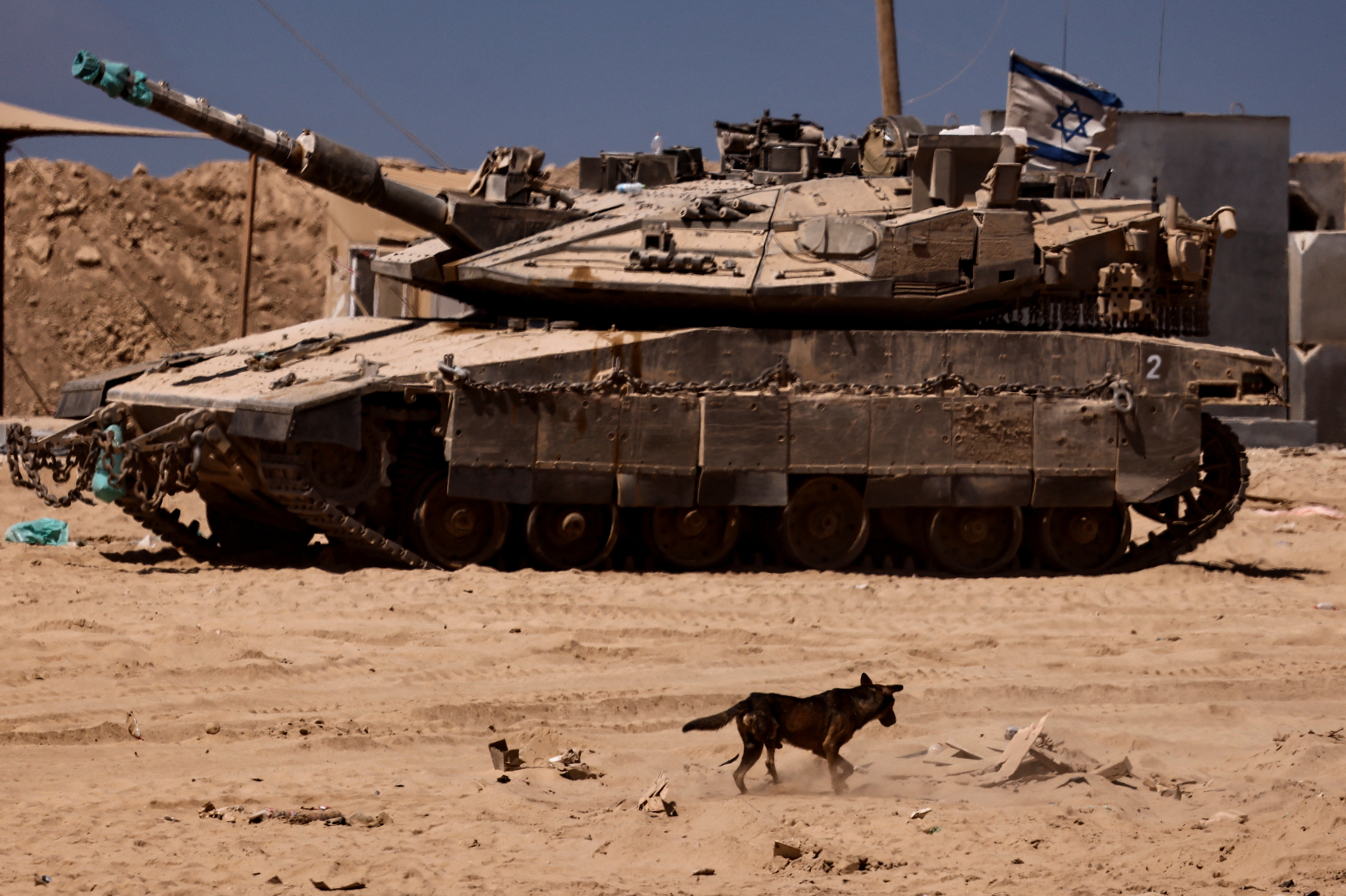 cover Israeli tanks push deeper into Gaza City as Trump talks peace