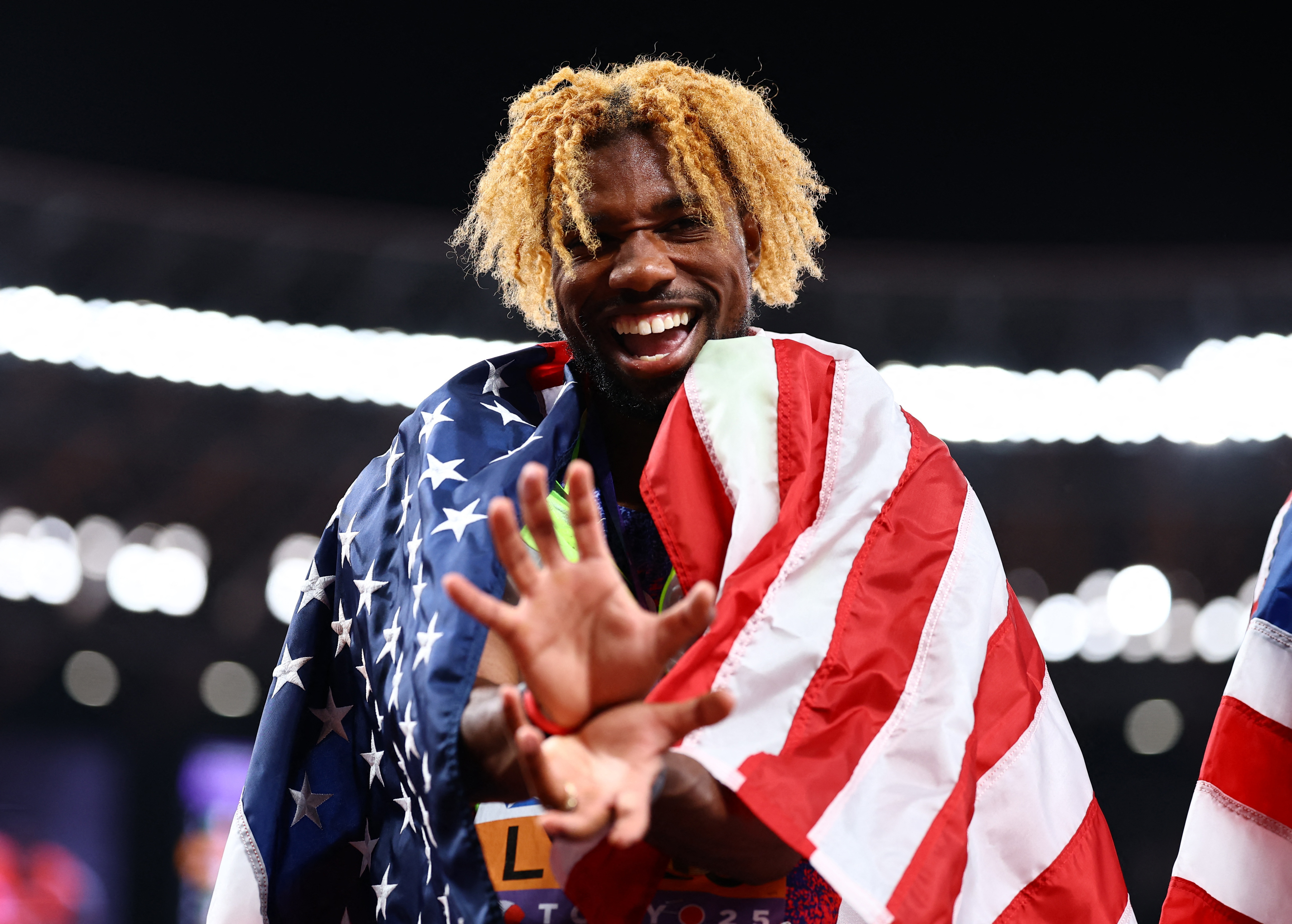 cover World Athletics Championships: Lyles surges late to win fourth successive 200m gold