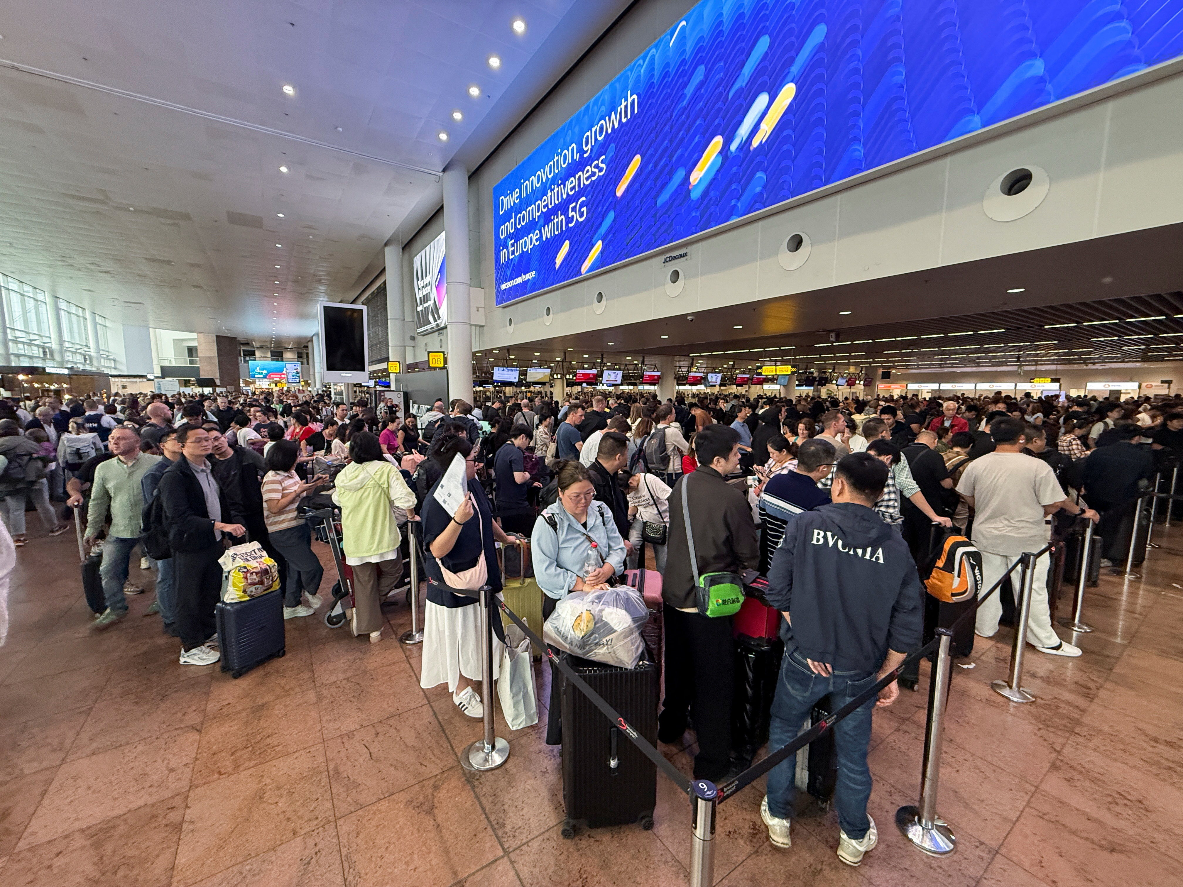 cover European airports struggle to fix check-in glitch after cyberattack