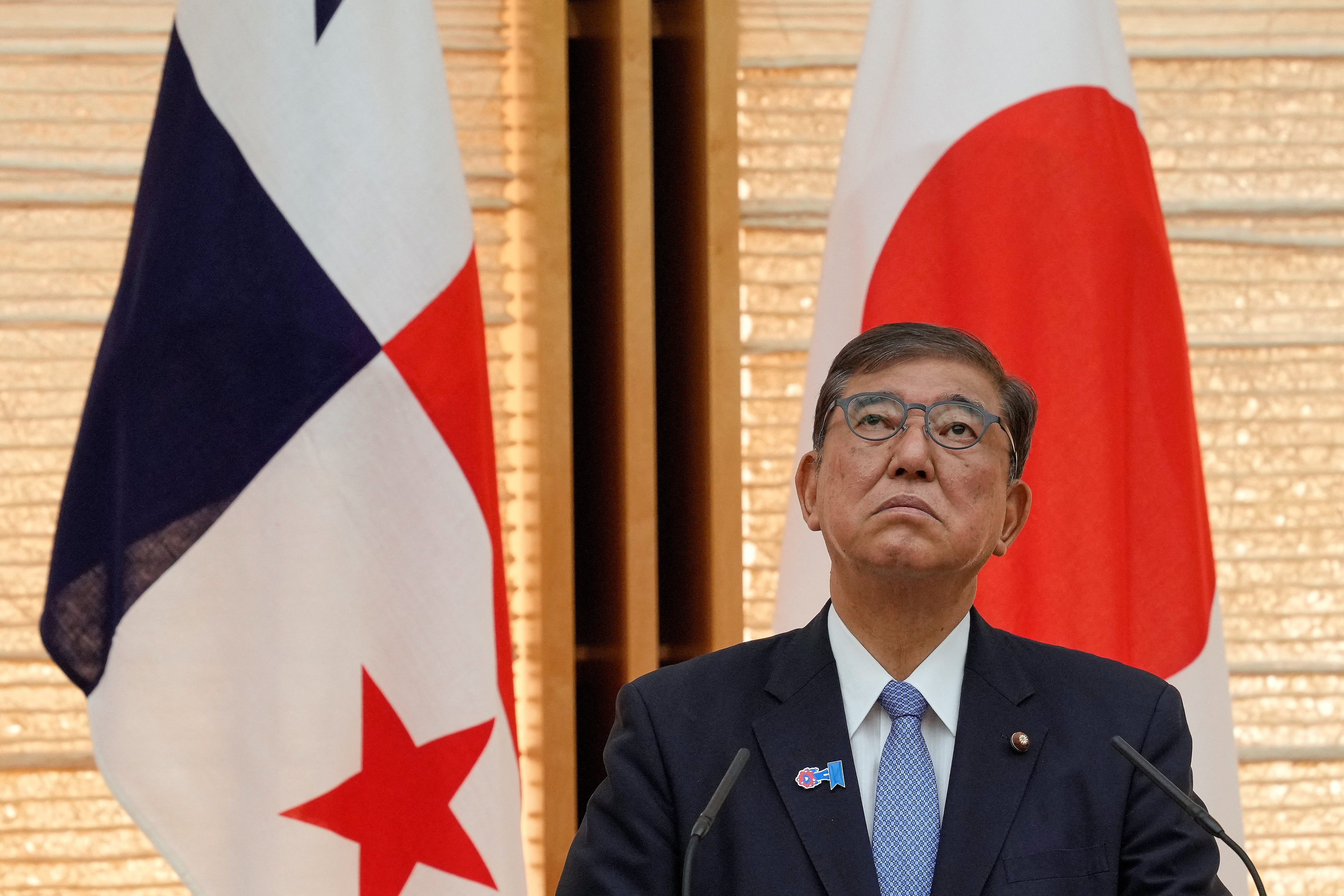 cover Japan PM Ishiba resigns after series of bruising election losses