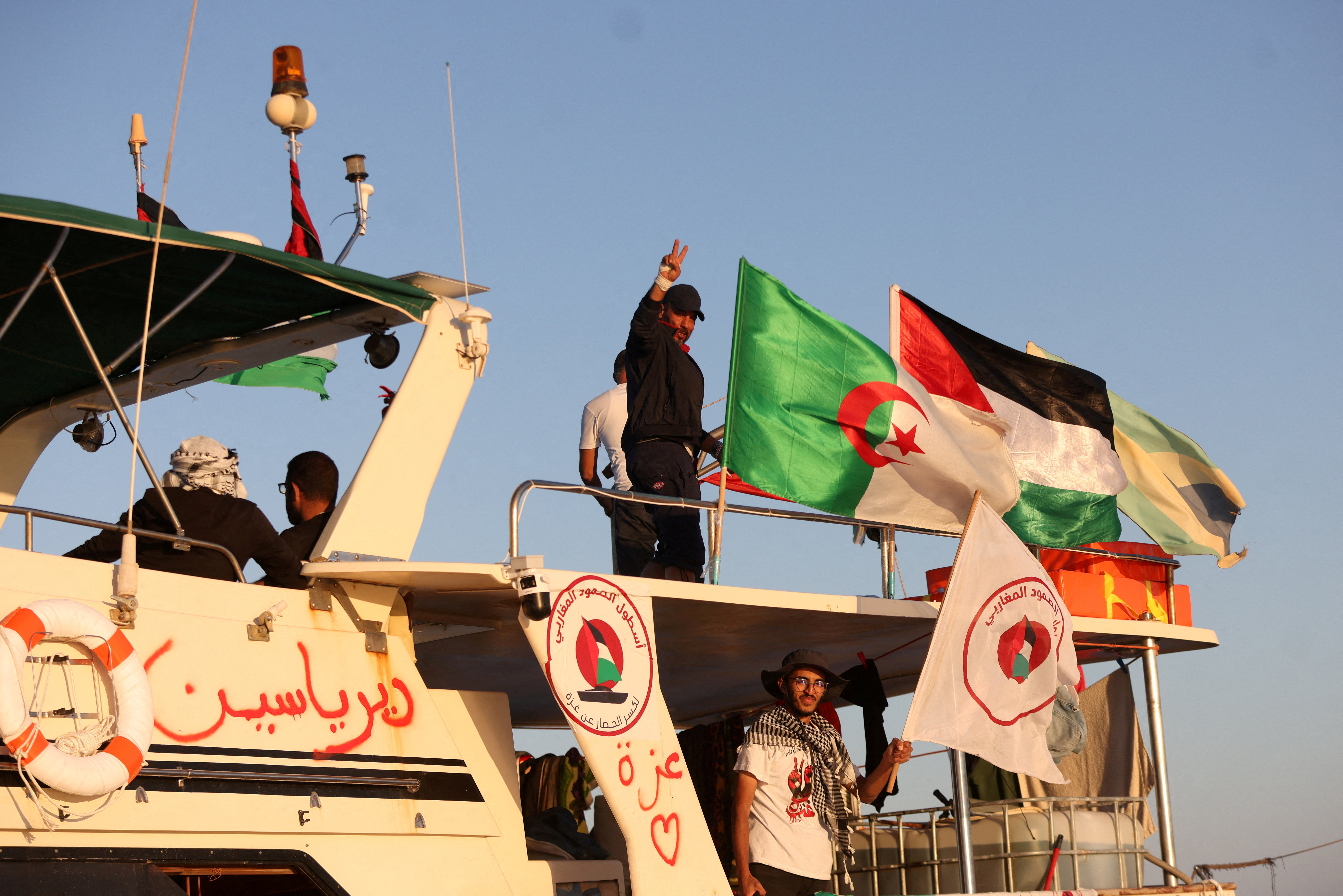 cover Gaza flotilla says Israeli vessels intimidated its boats as it nears blockade