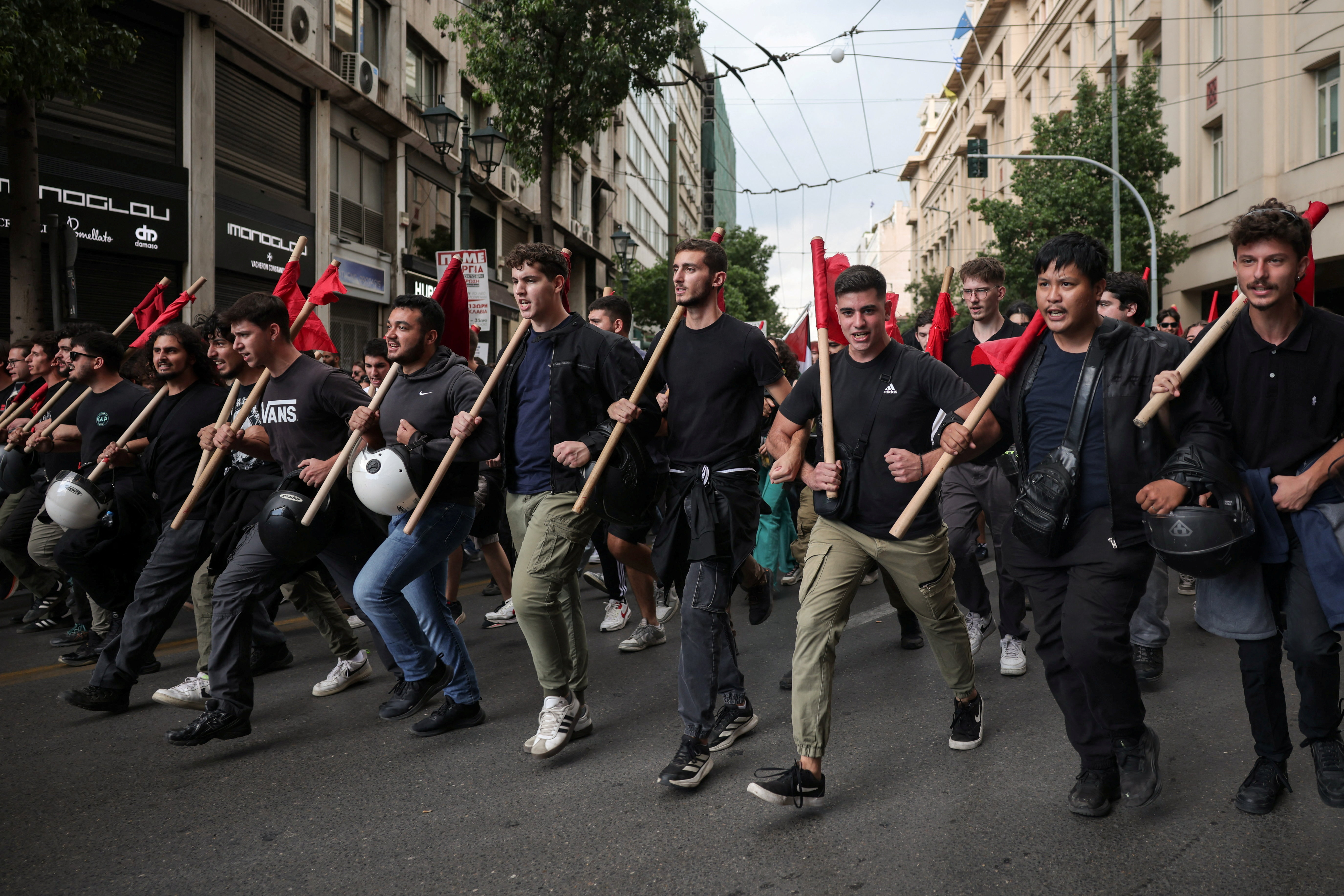 cover Greek ferries and trains halted as thousands protest over working hours