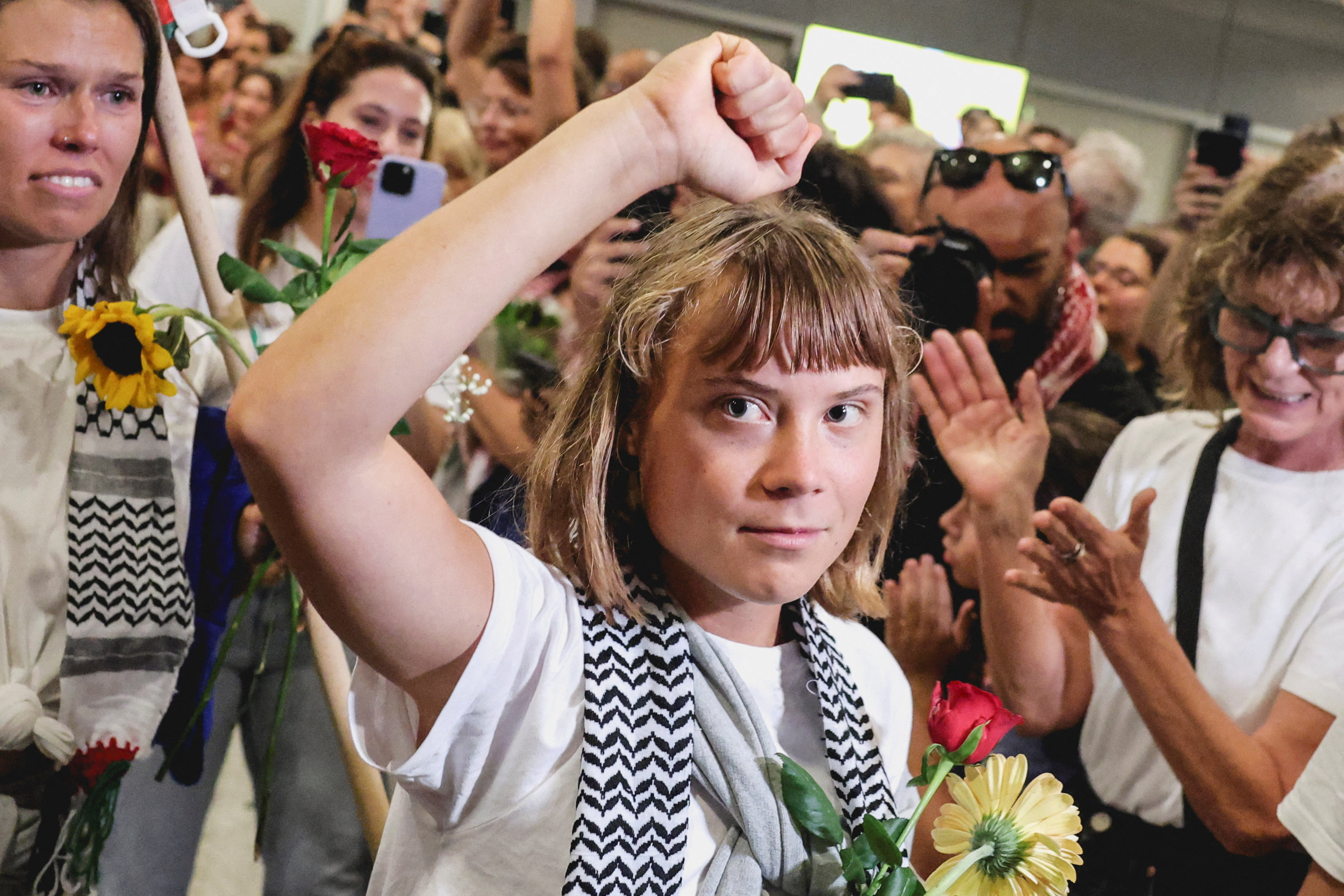 cover Thunberg greeted by cheering crowd in Athens after Israel expels flotilla activists