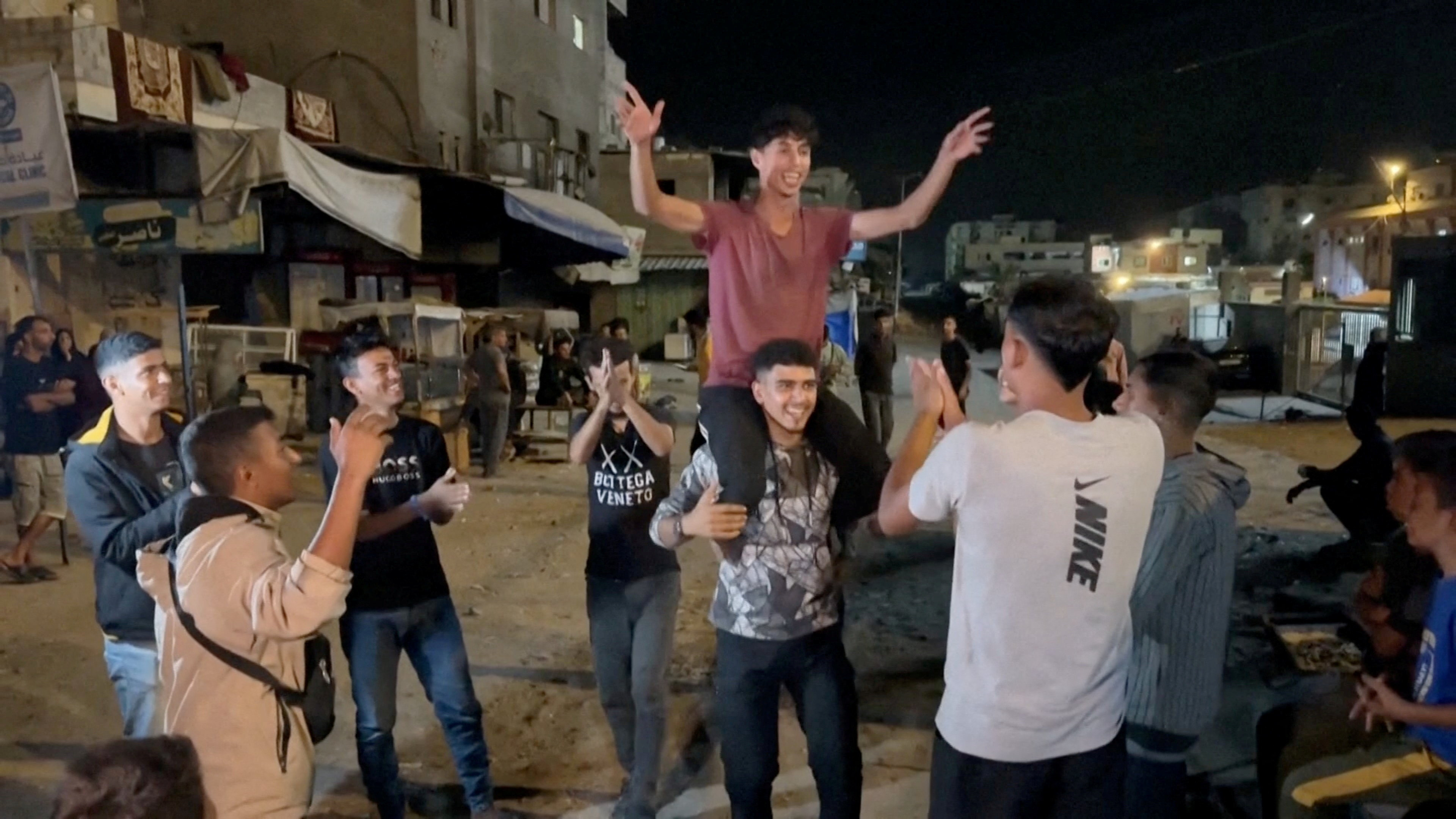 cover Celebrations erupt in Gaza, Israel on news of deal to end two-year war