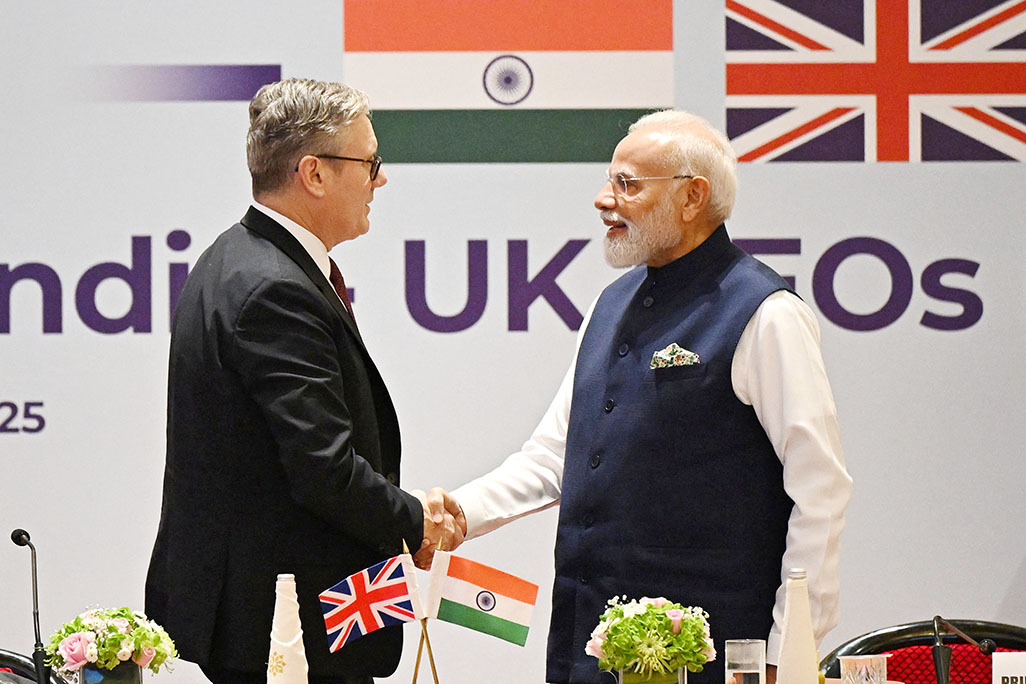 cover Modi and Starmer tout India-UK trade deal