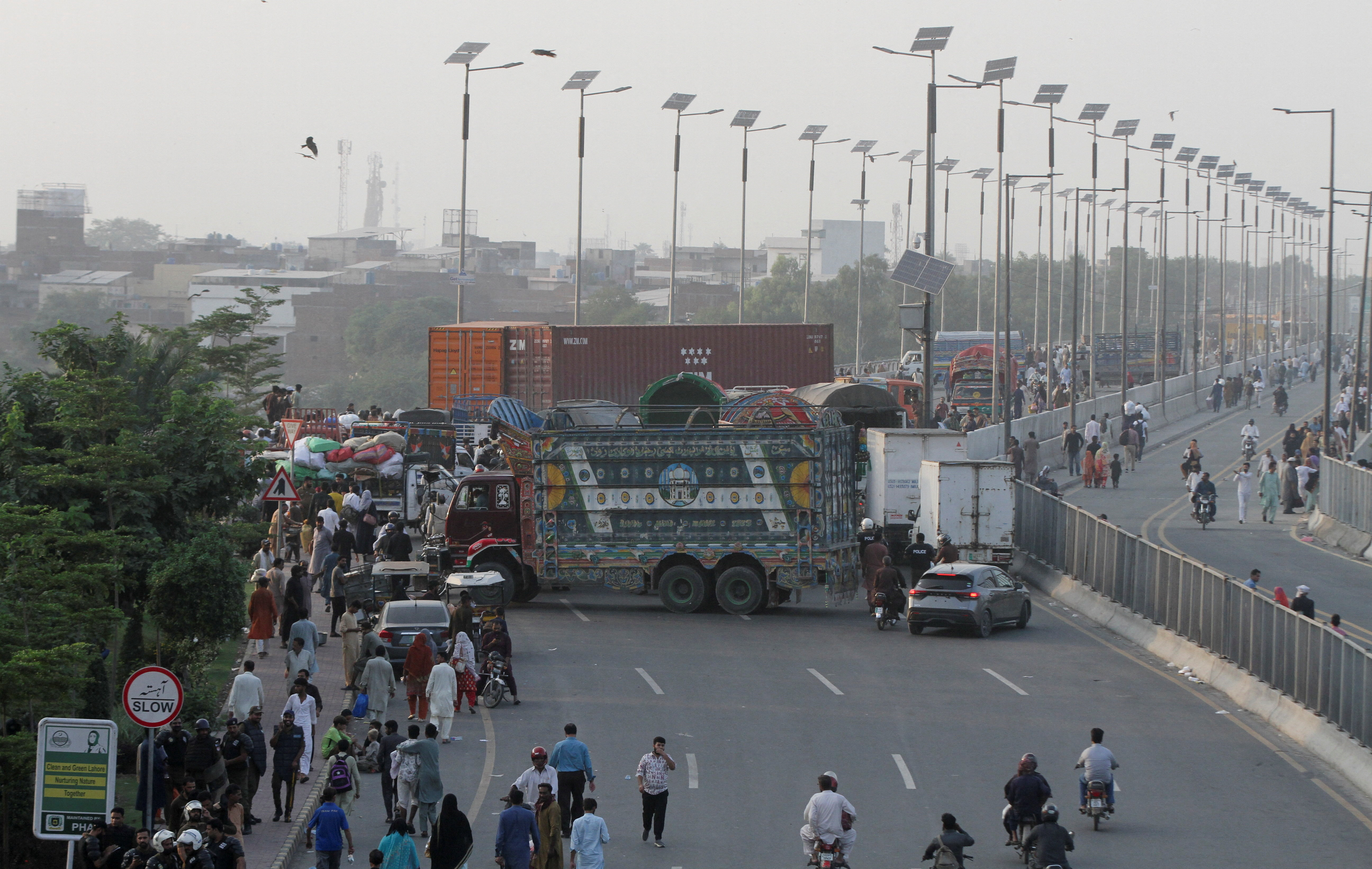 cover Pakistan bans Islamist party after deadly clashes