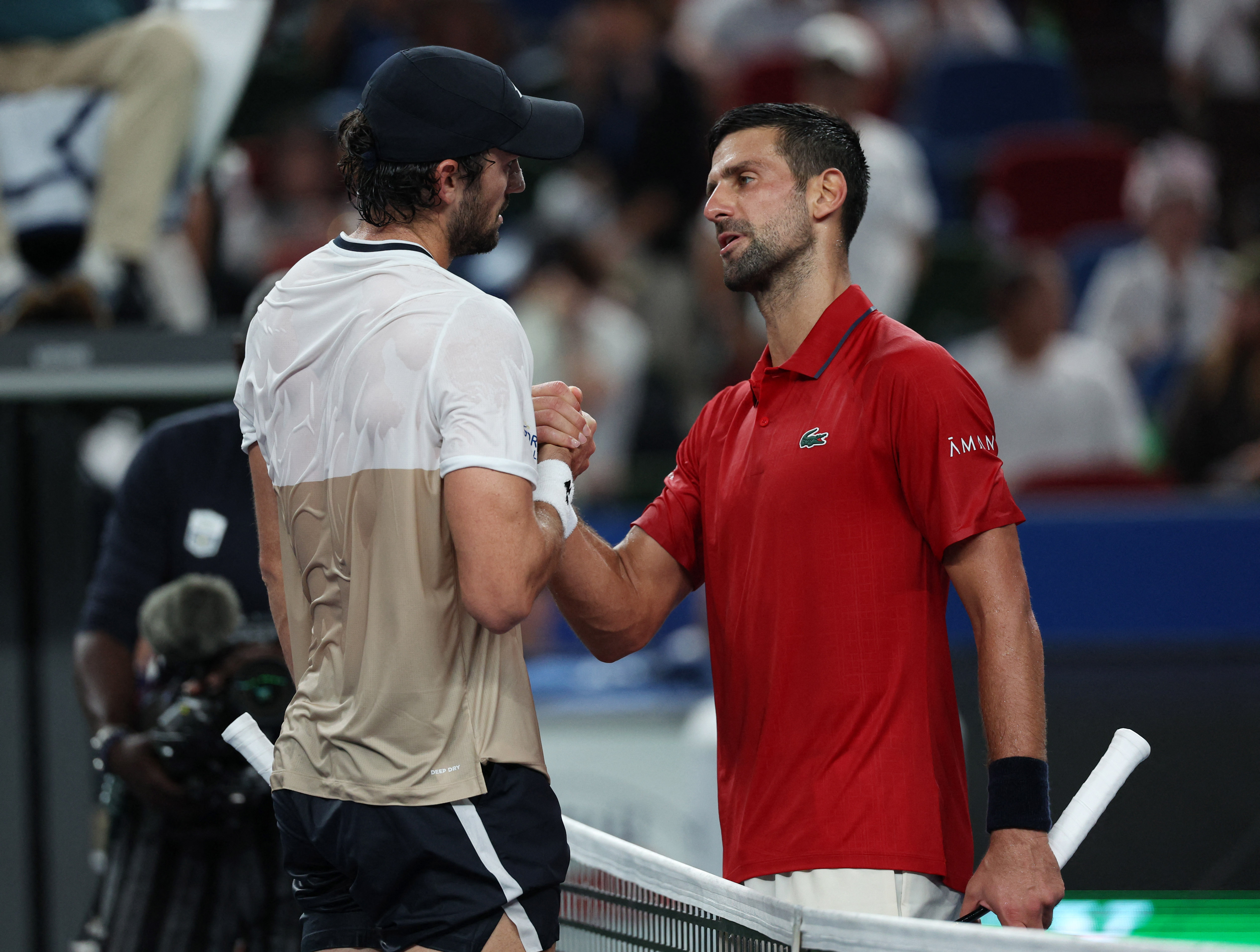 cover Vacherot stuns Djokovic to reach Shanghai final