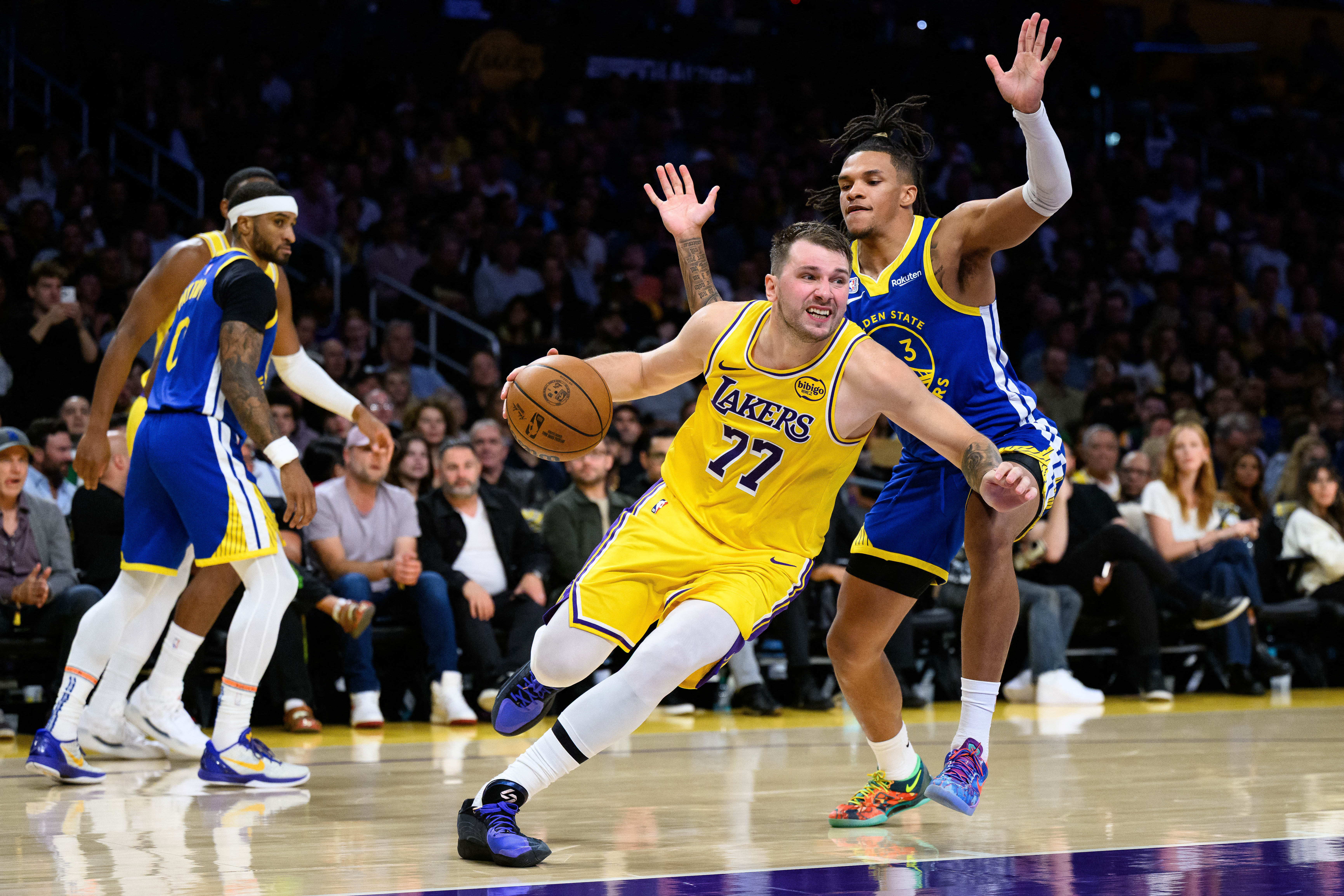 cover Luka Doncic downplays injury concerns after opener