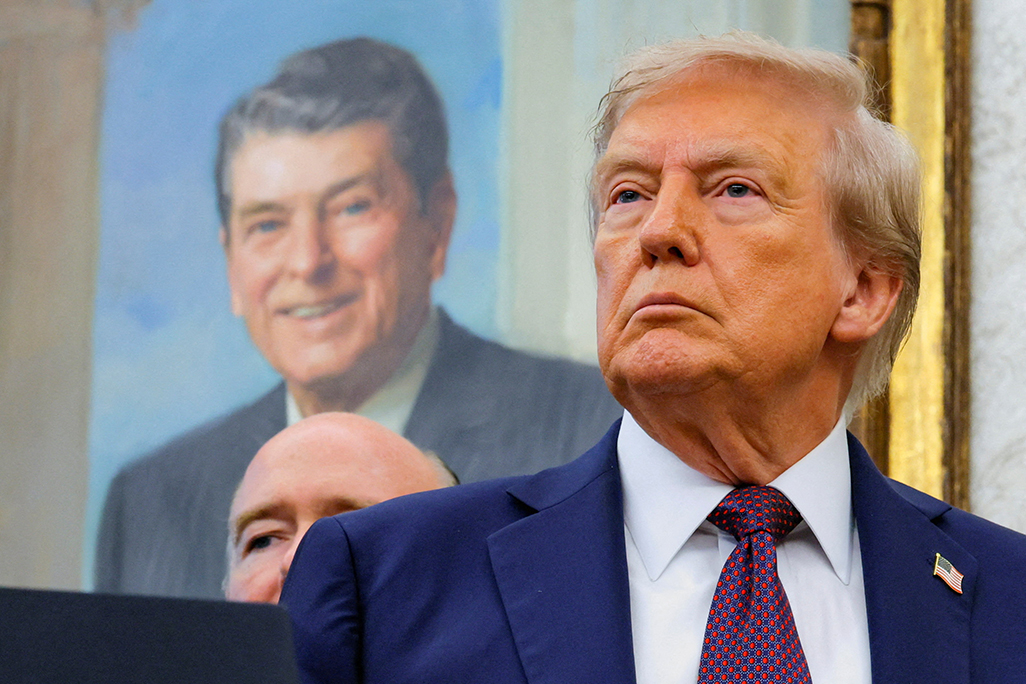 cover A ghost in the Oval Office: How Reagan looms over Trump presidency