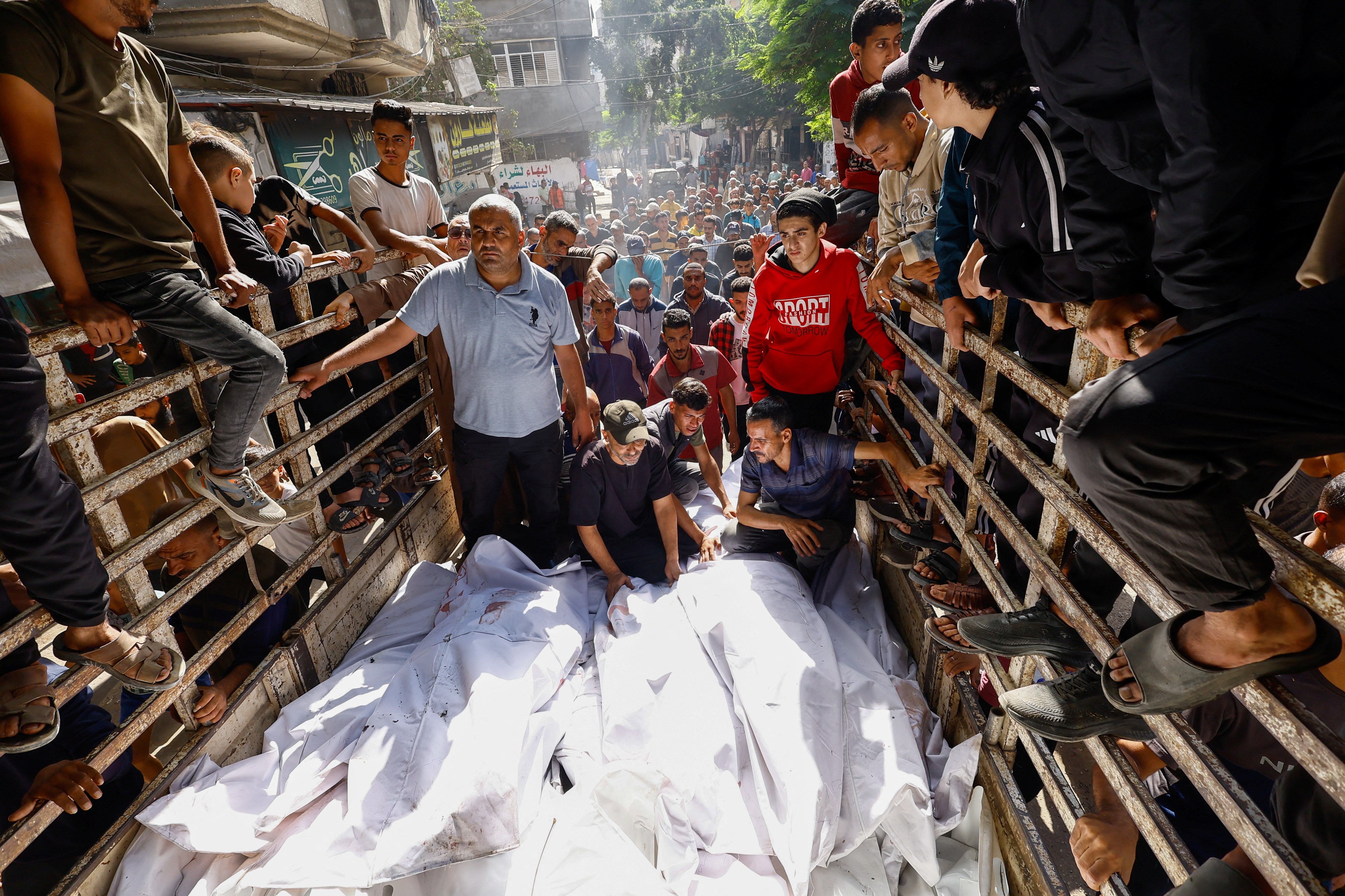cover Israel says it will uphold Gaza ceasefire as strikes kill 104 people