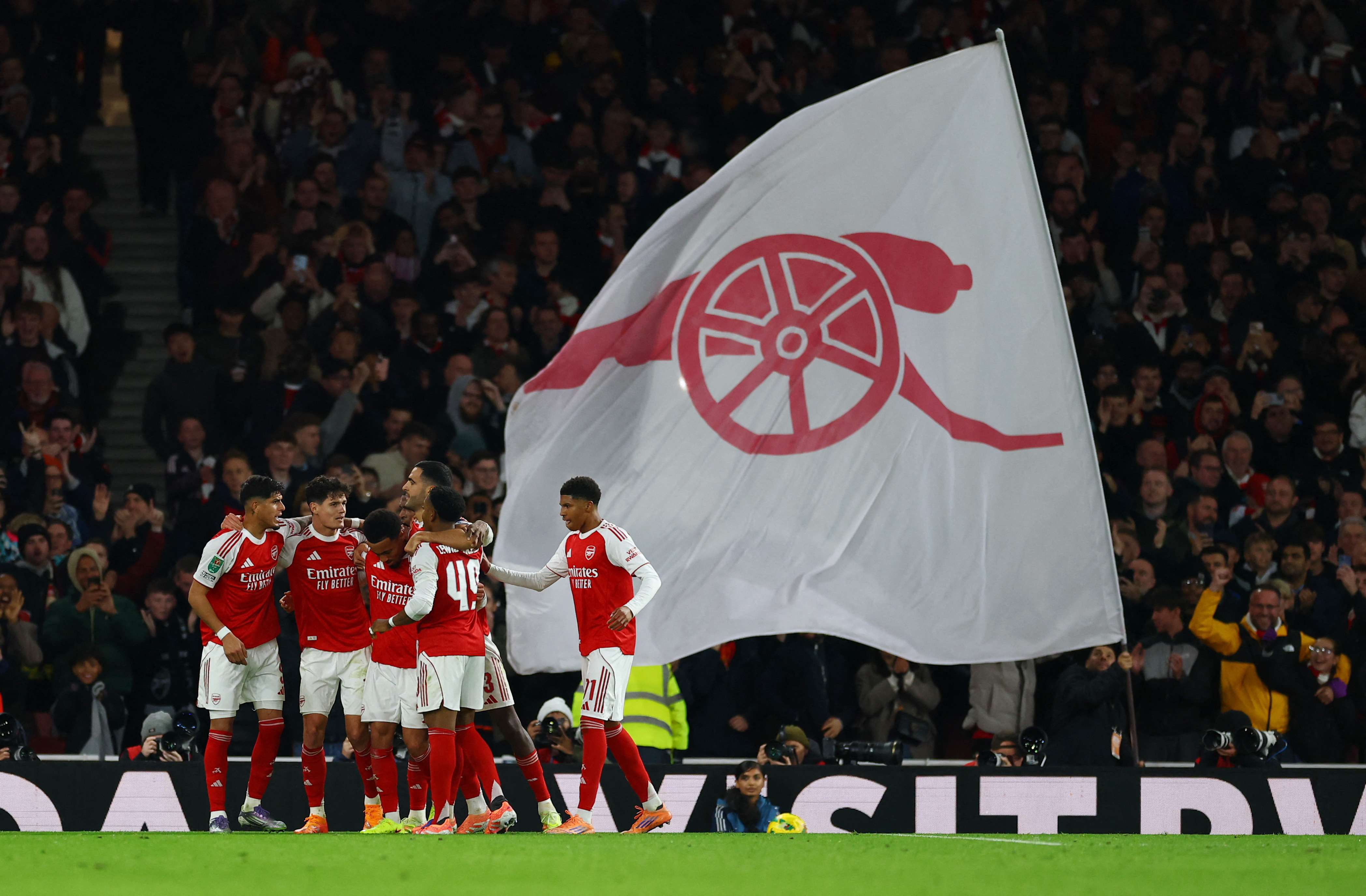 cover Arsenal visit Burnley with early momentum in Premier League title race