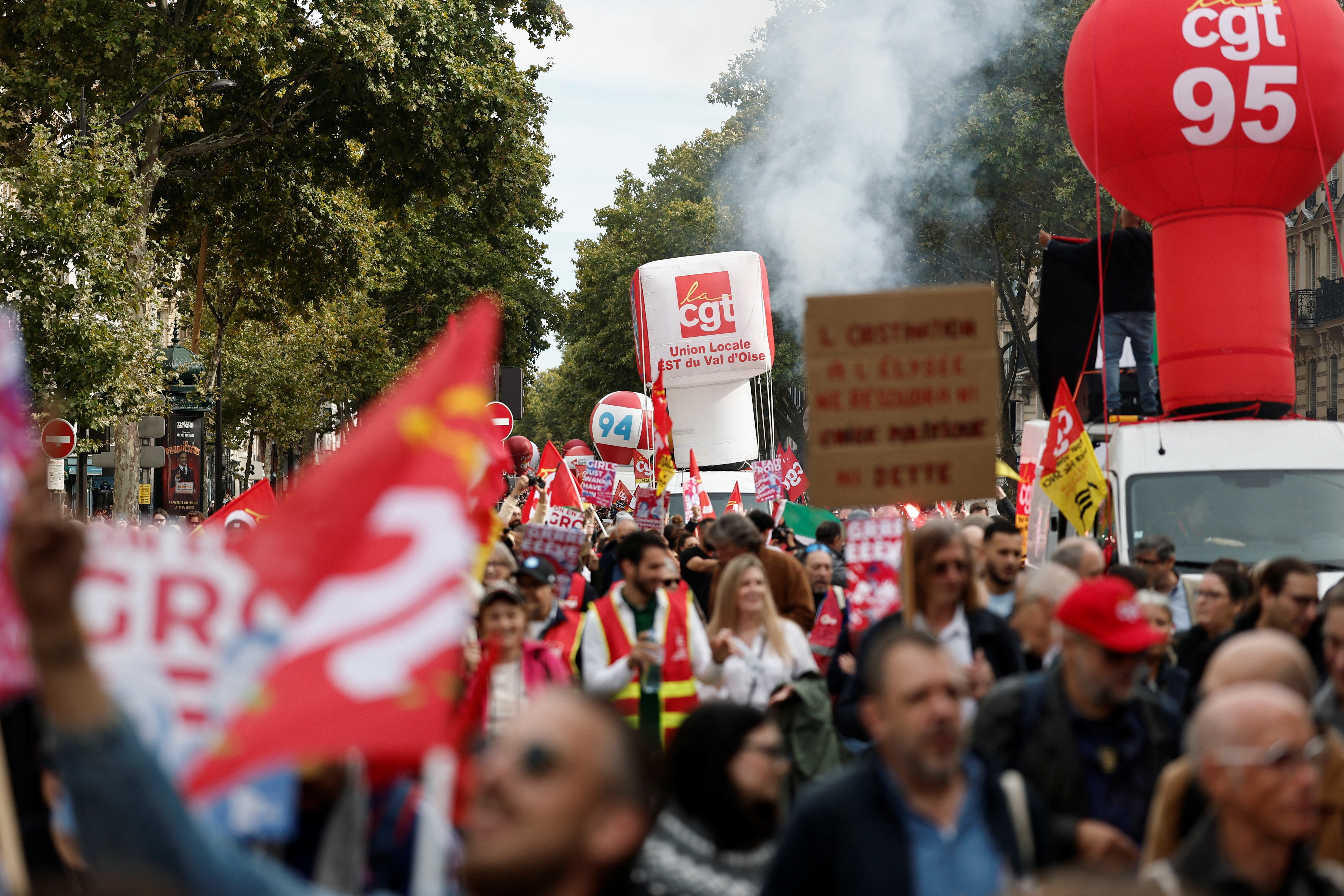 cover Thousands protest in France against spending cuts