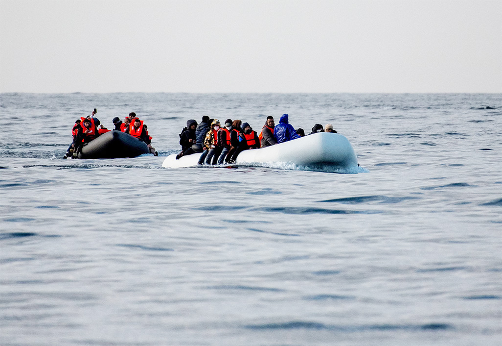cover Migrant sent back to France by Britain returns on a small boat