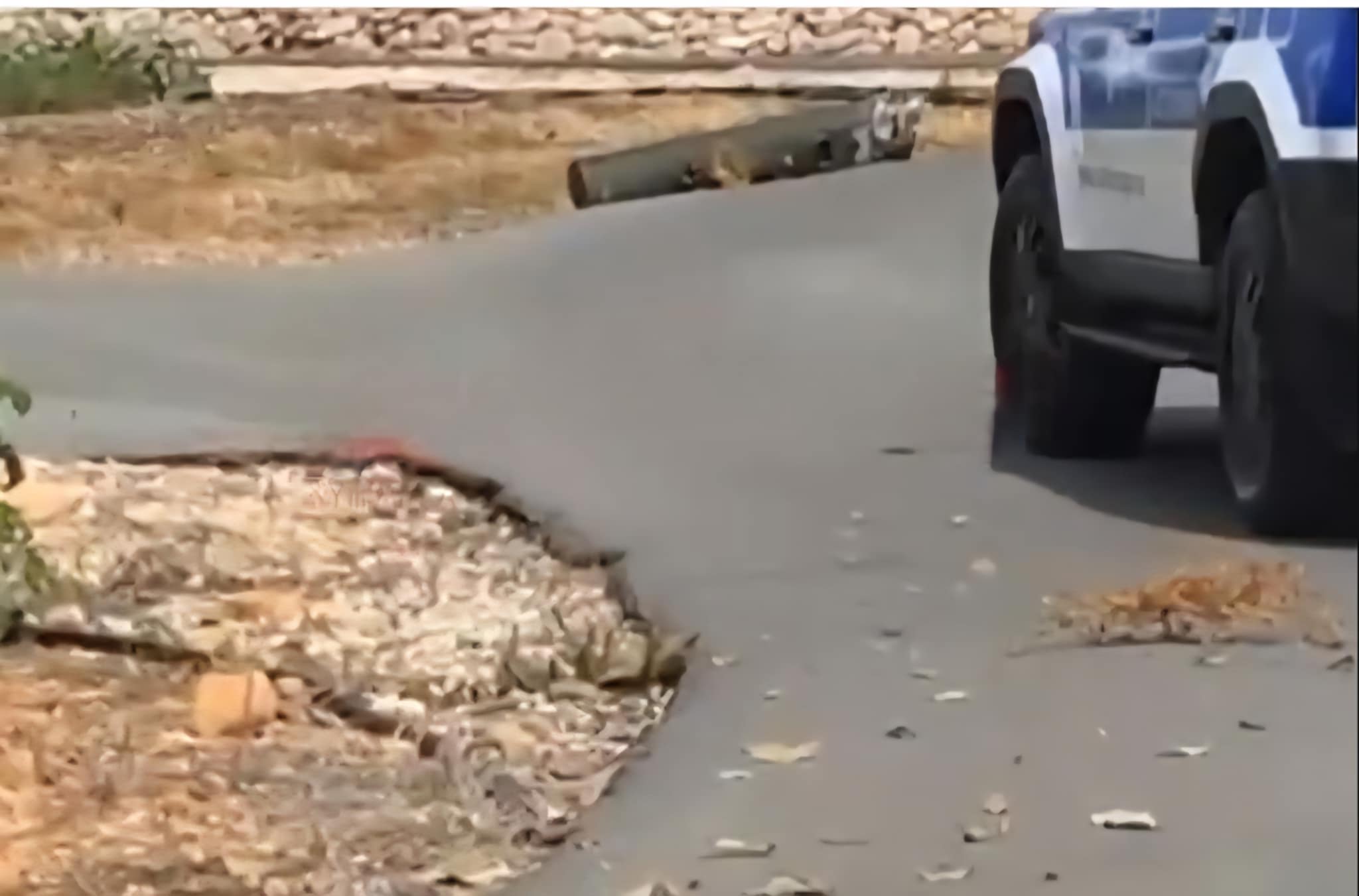 Arms land in residential area after dropping off military helicopter
