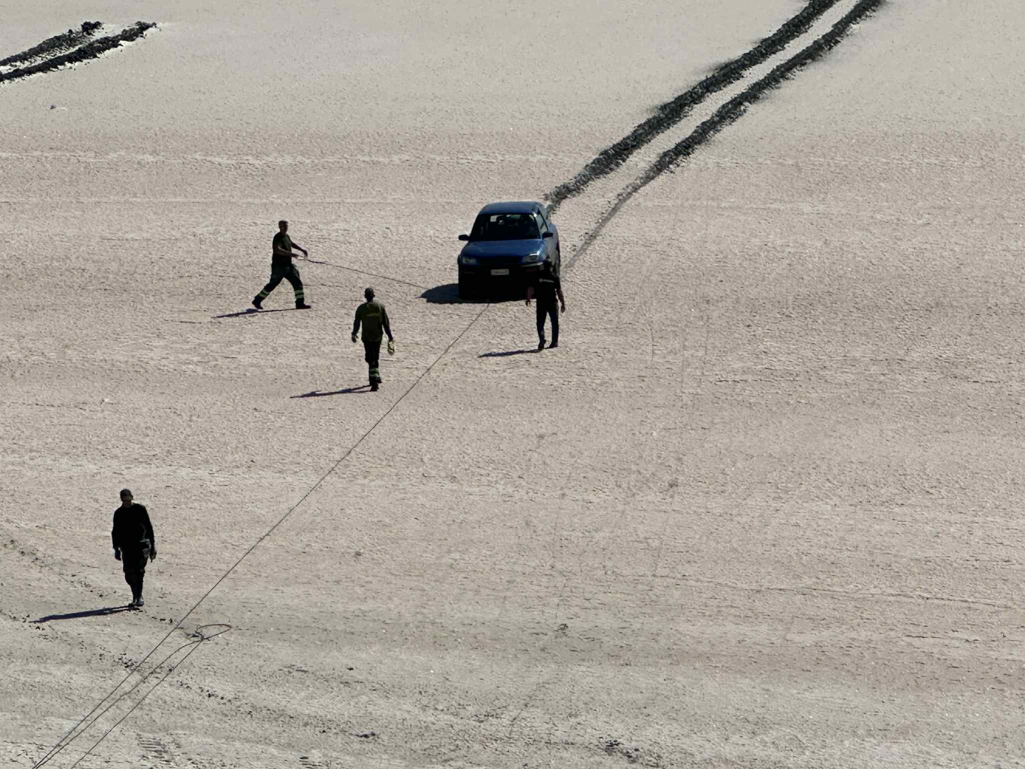 image Cars stuck in Larnaca salt lake finally removed