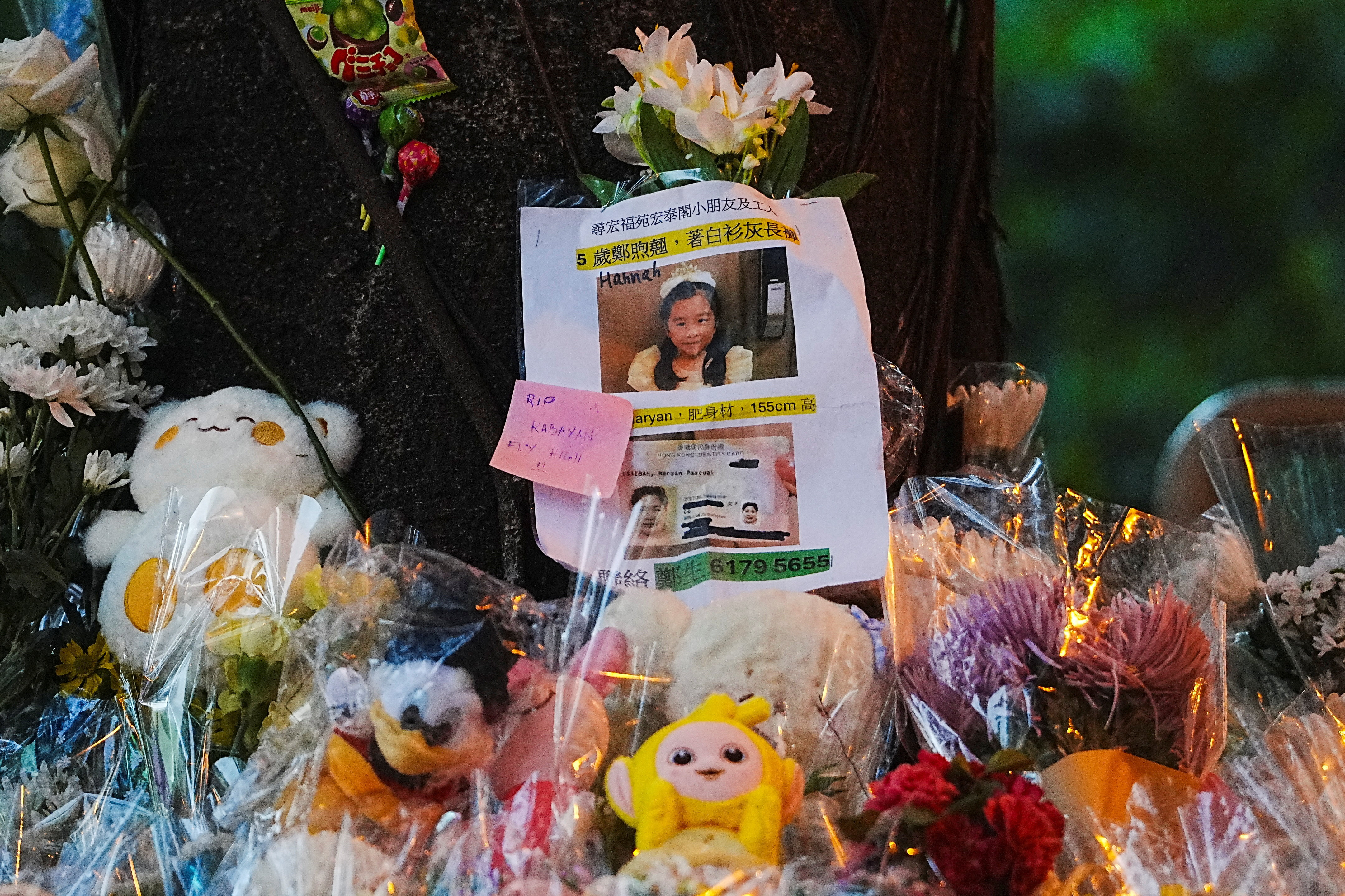 cover Hong Kong mourns victims of blaze that killed 128 and counting