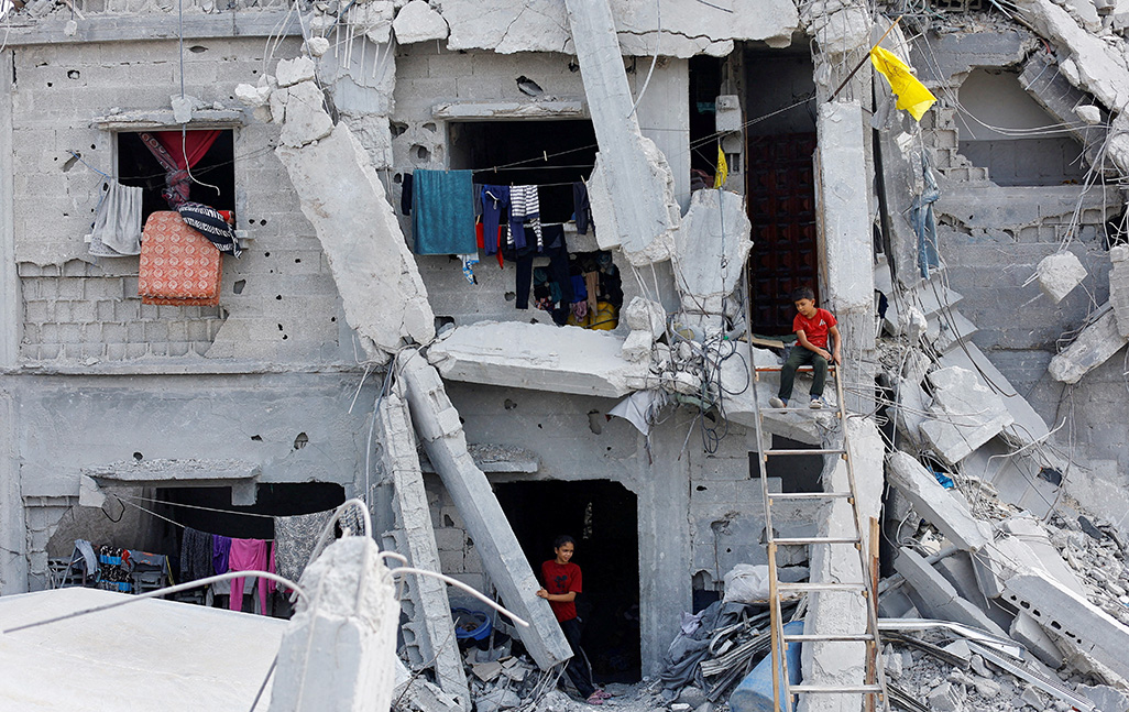 cover Israeli airstrikes kill 10 Palestinians in Gaza, rattling ceasefire, medics say