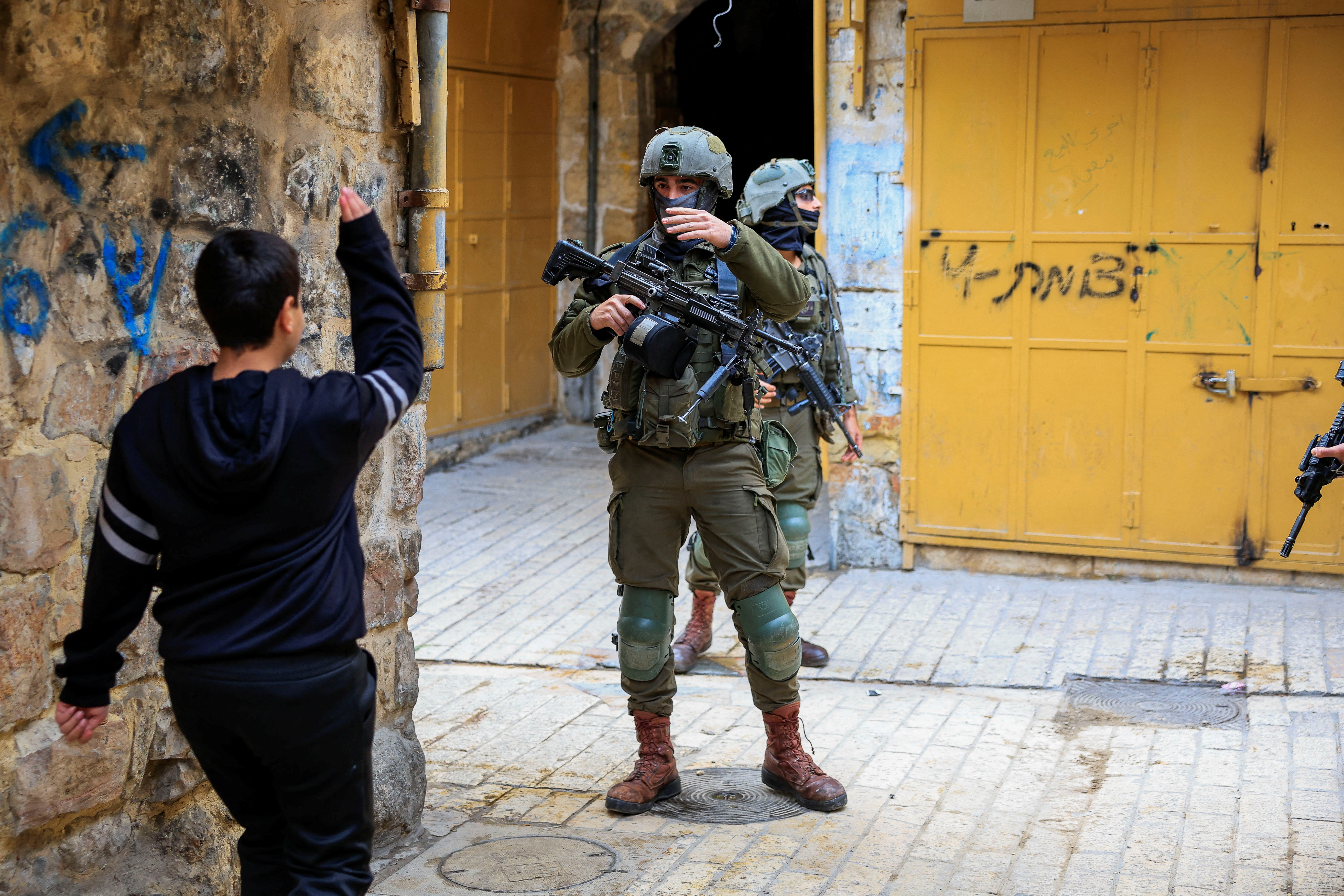 cover Israeli reservist rams vehicle into Palestinian man praying in West Bank