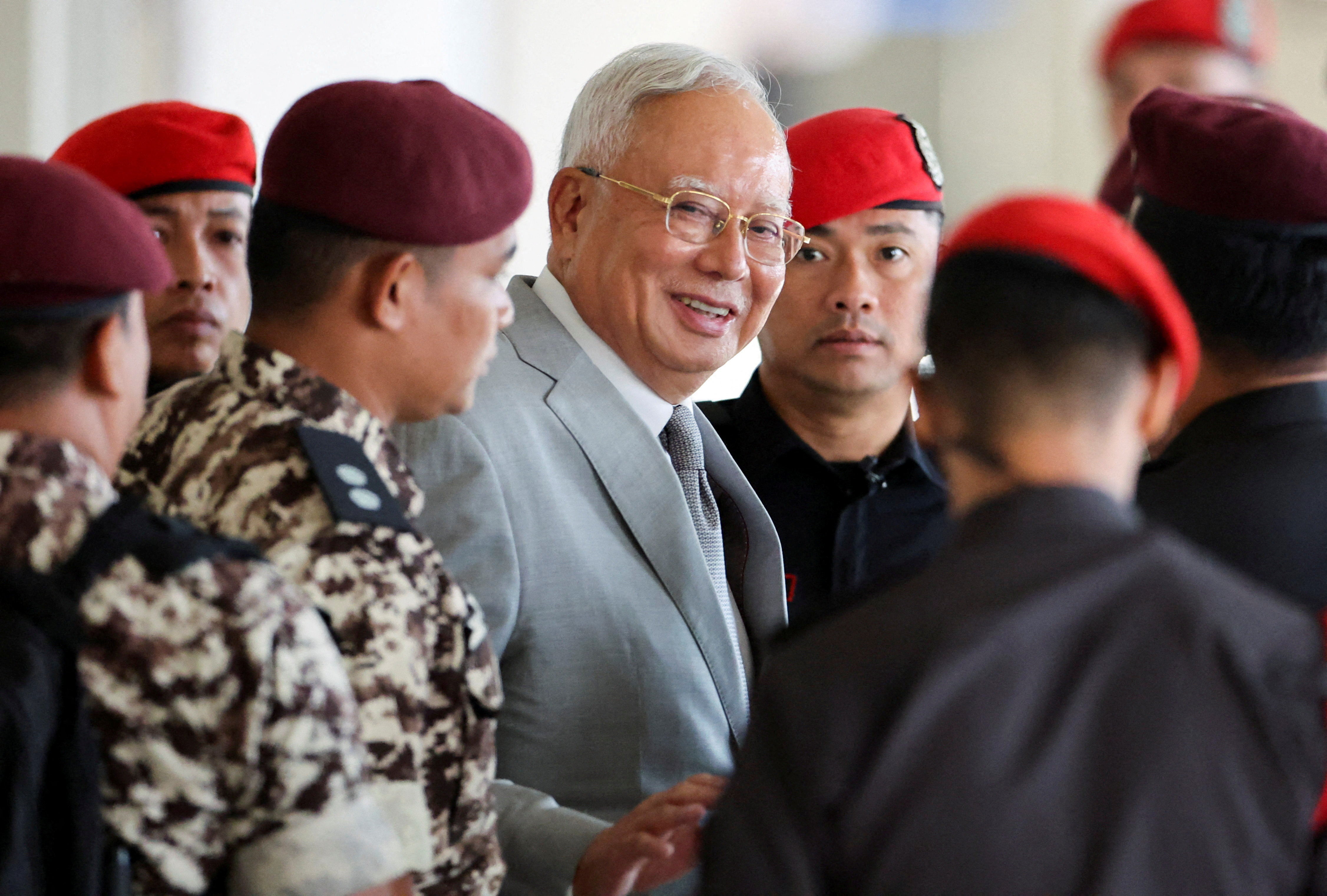 cover Malaysia court convicts ex-PM Najib Razak of power abuse, money laundering in biggest 1MDB trial