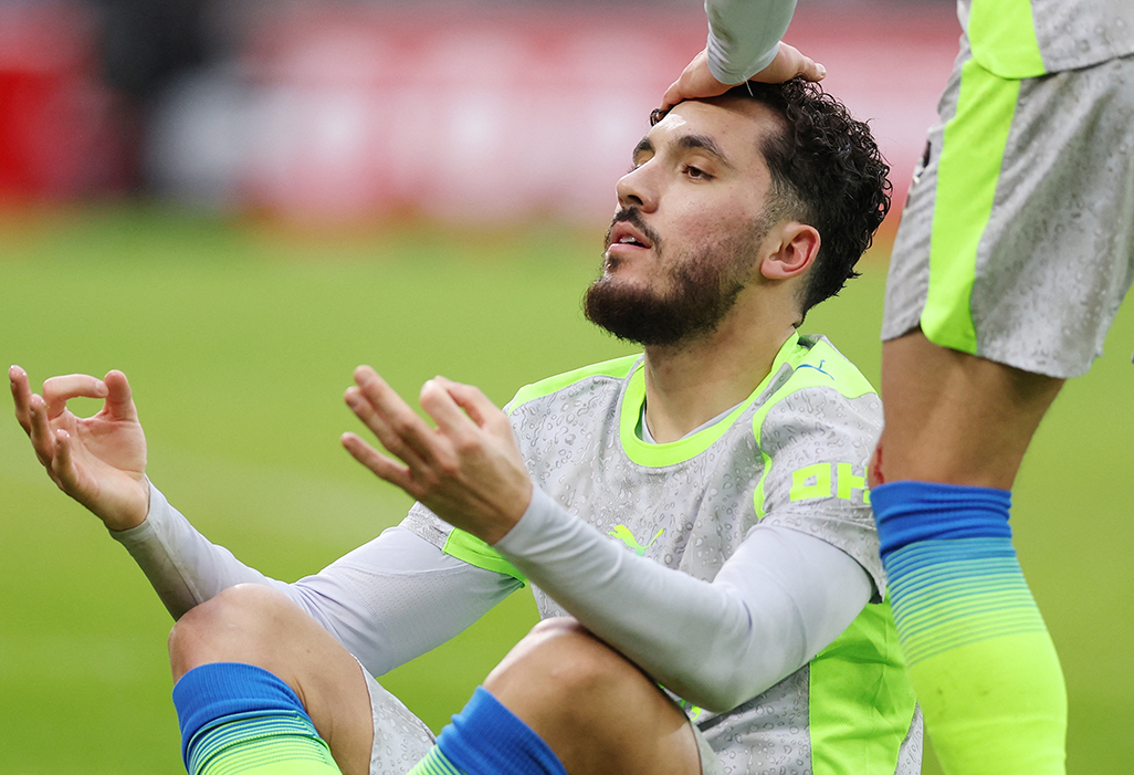 cover Man City go top with 2-1 win at Forest after Cherki heroics