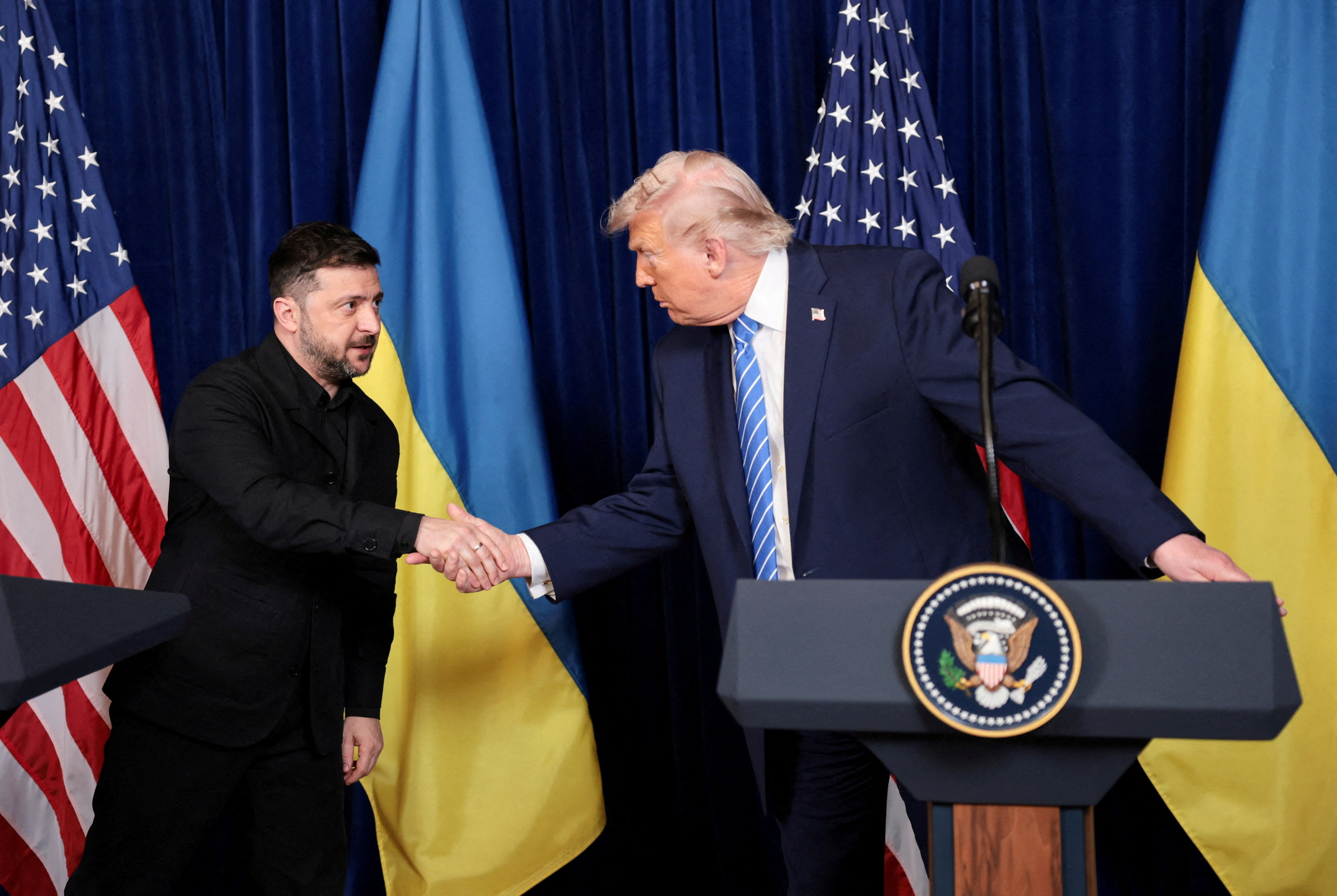 cover Trump, Zelenskiy report gains on security guarantees, Donbas still in dispute