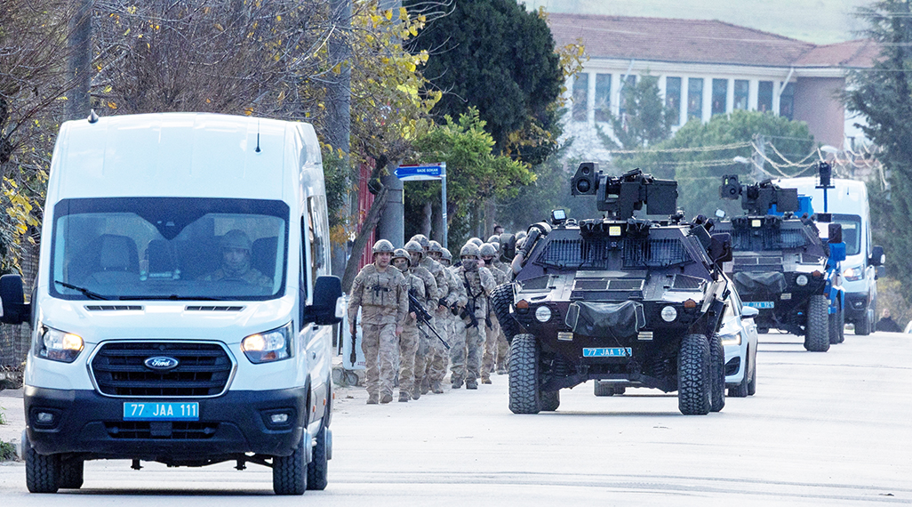 image Three Turkish police, six Islamic State militants killed in clash, amid national crackdown