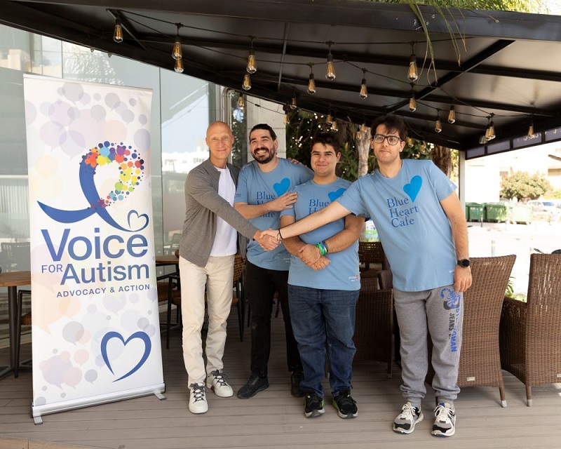 Andrey Dashin, (left) Founder of the Andrey and Julia Dashin’s Foundation, and the Voice for Autism team at the Blue Heart Café. 
