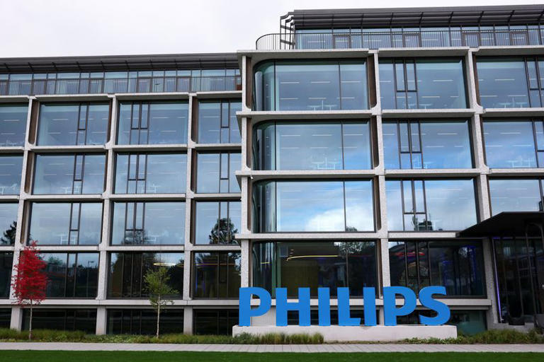 cover Philips shares fall as management tempers growth expectations