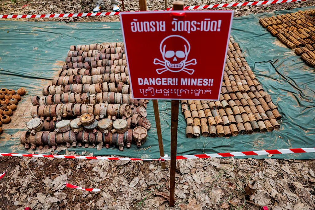 cover Landmine casualties hit four-year high as states exit ban treaty