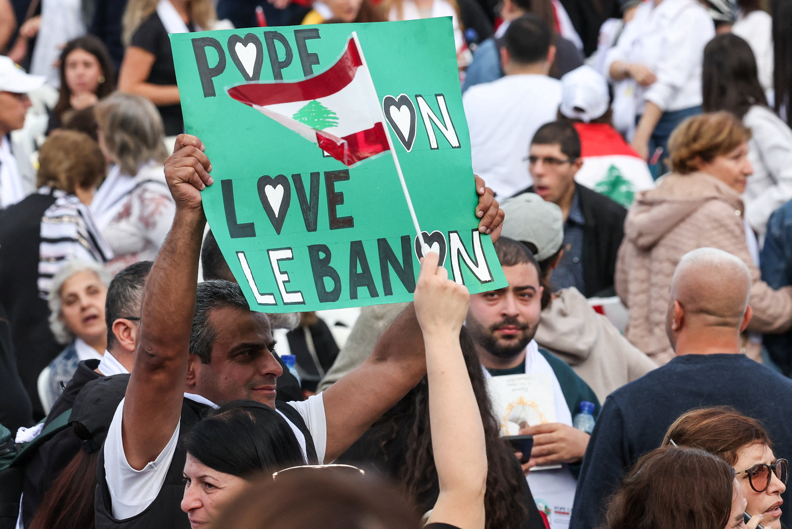 cover Pope urges crowds in Lebanon to fix troubled country at last overseas event