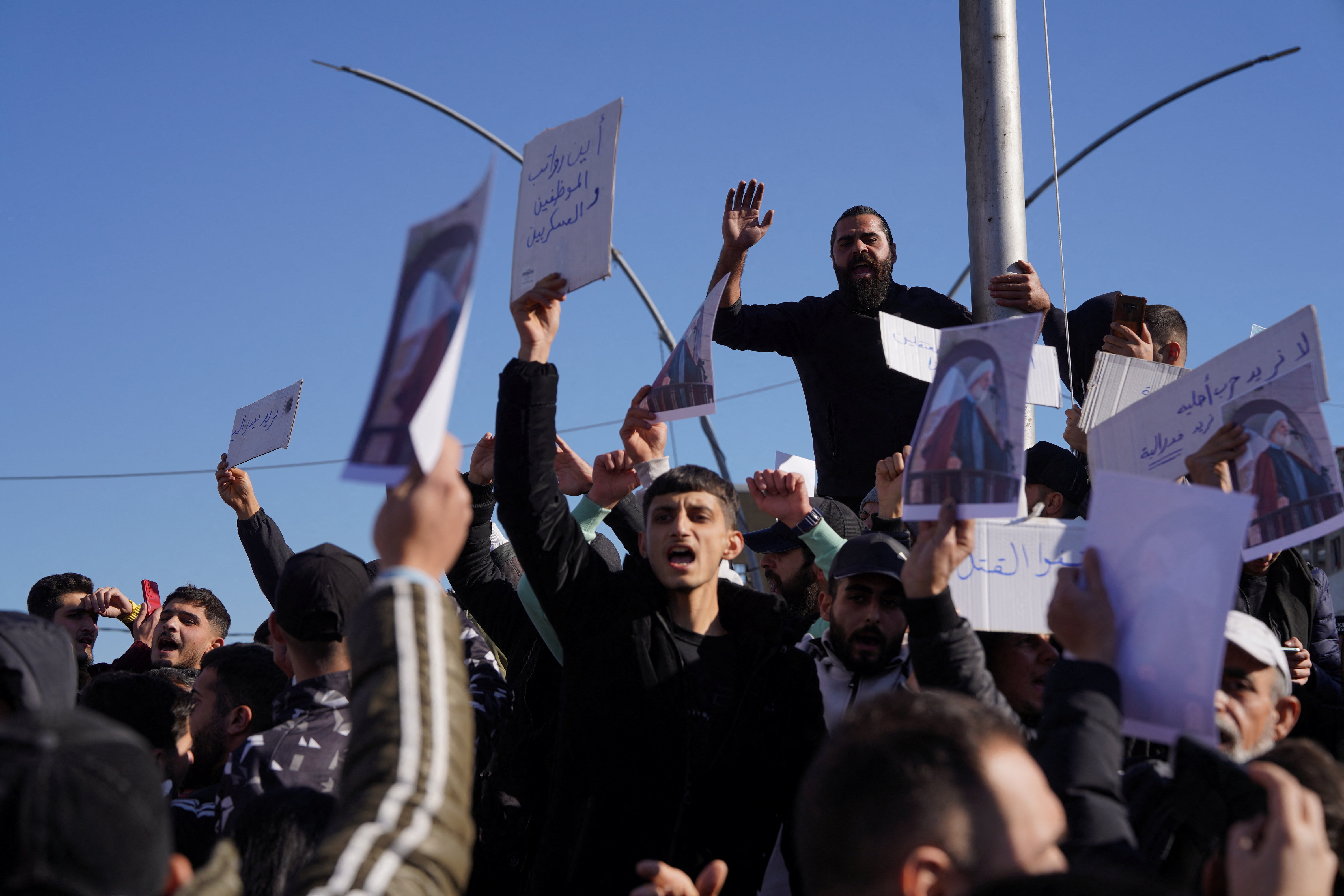 cover Three dead in Alawite protests on Syrian coast, local officials say