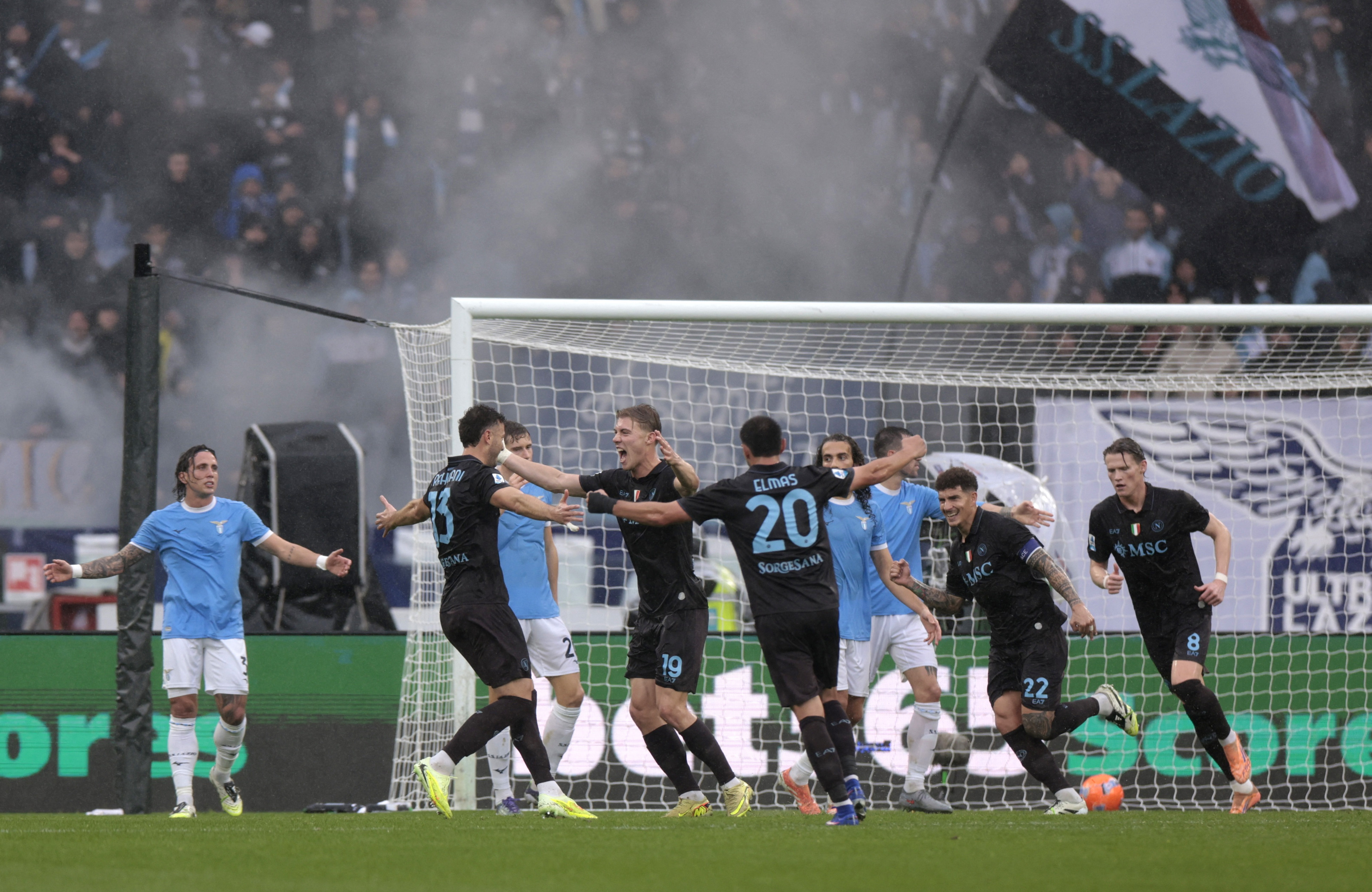 image Napoli keep pace in title race after defeating Lazio in stormy contest