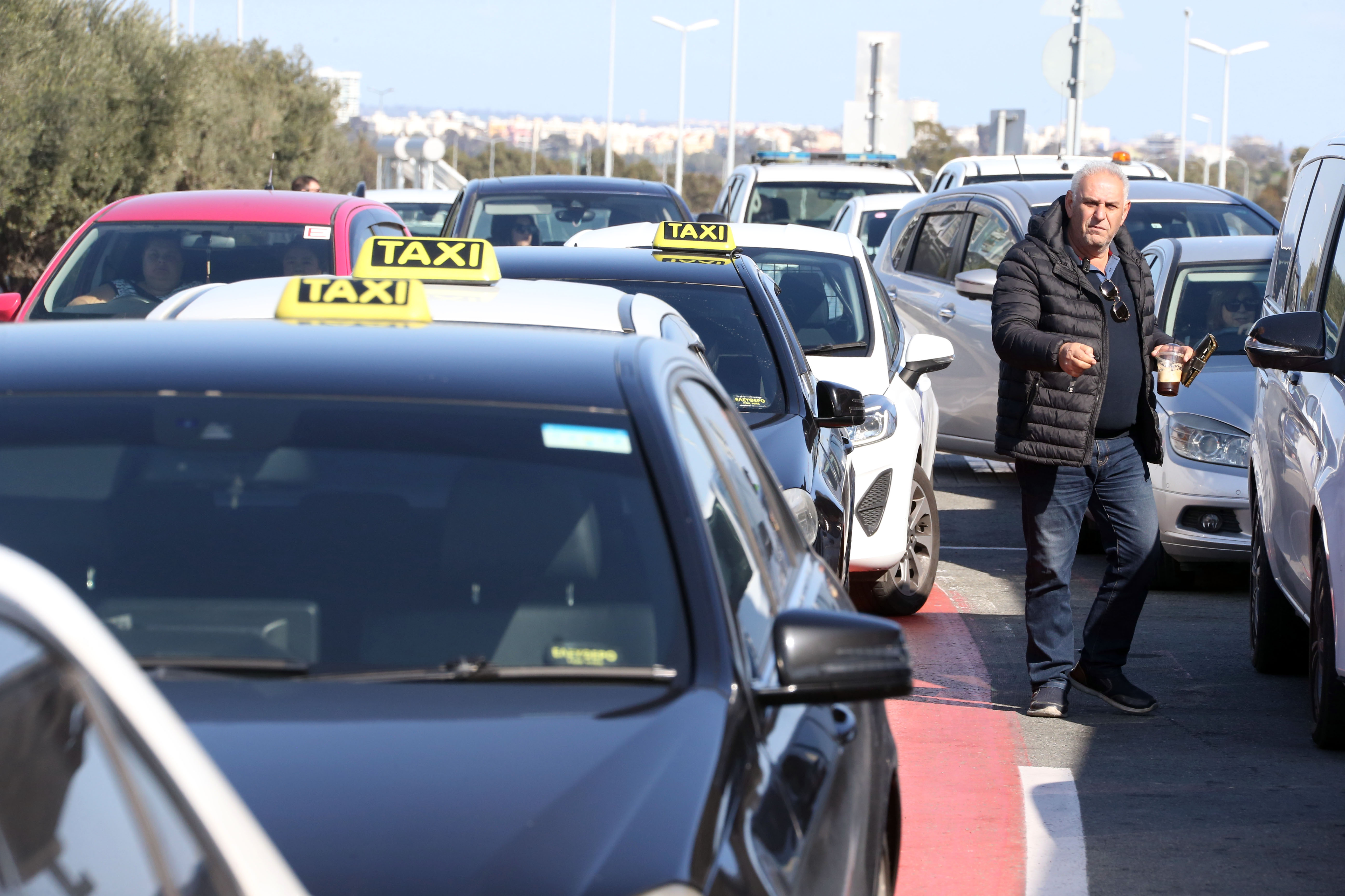 image Taxi drivers on strike, determined to press on