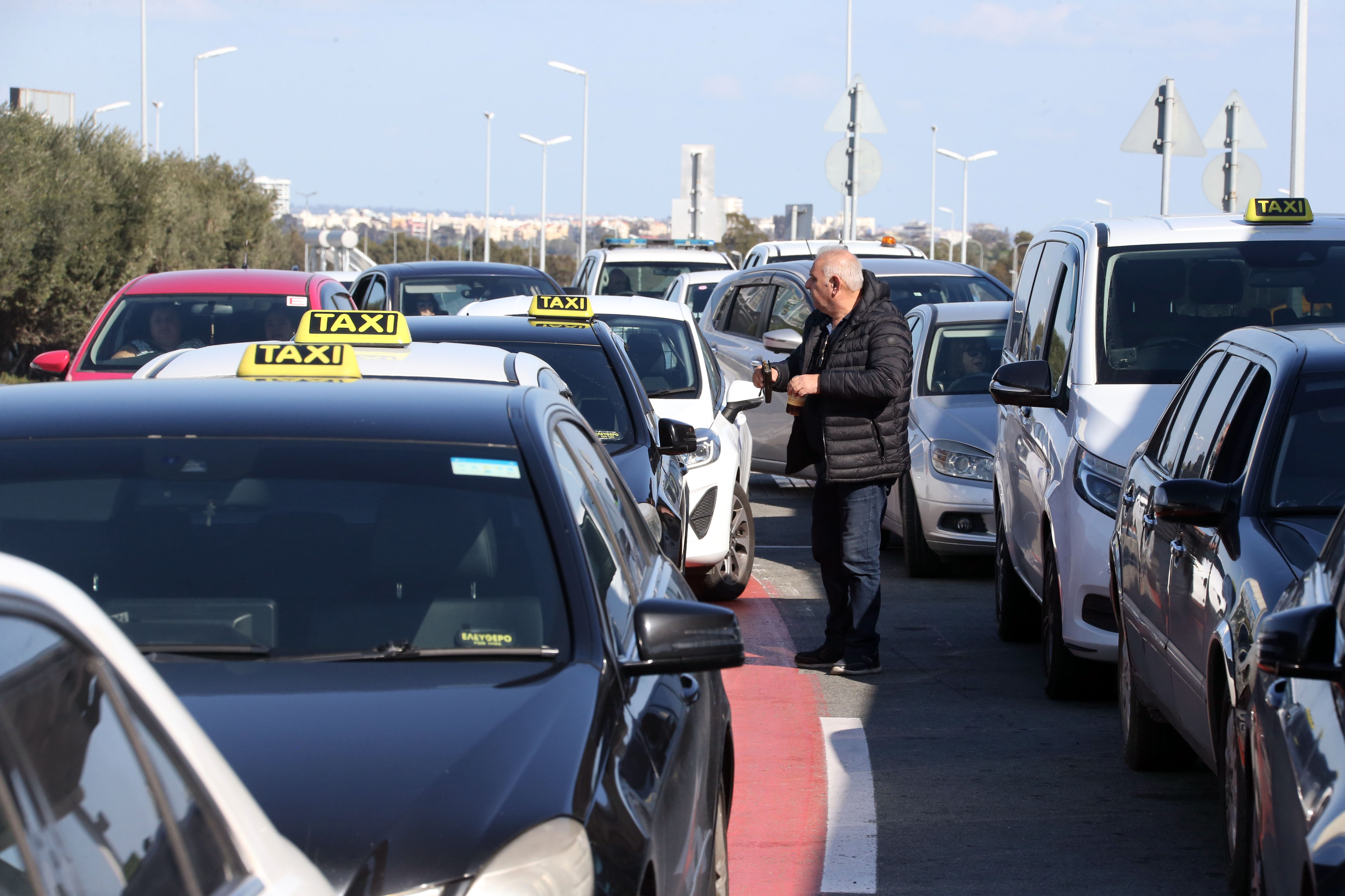 cover Larnaca taxi drivers call strike off